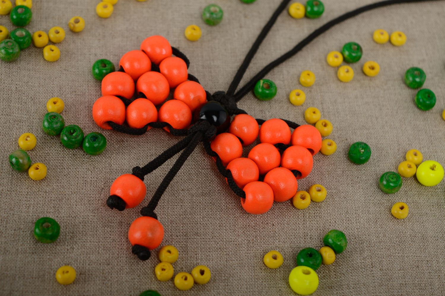Macrame necklace made of polyester cord and wooden beads photo 4