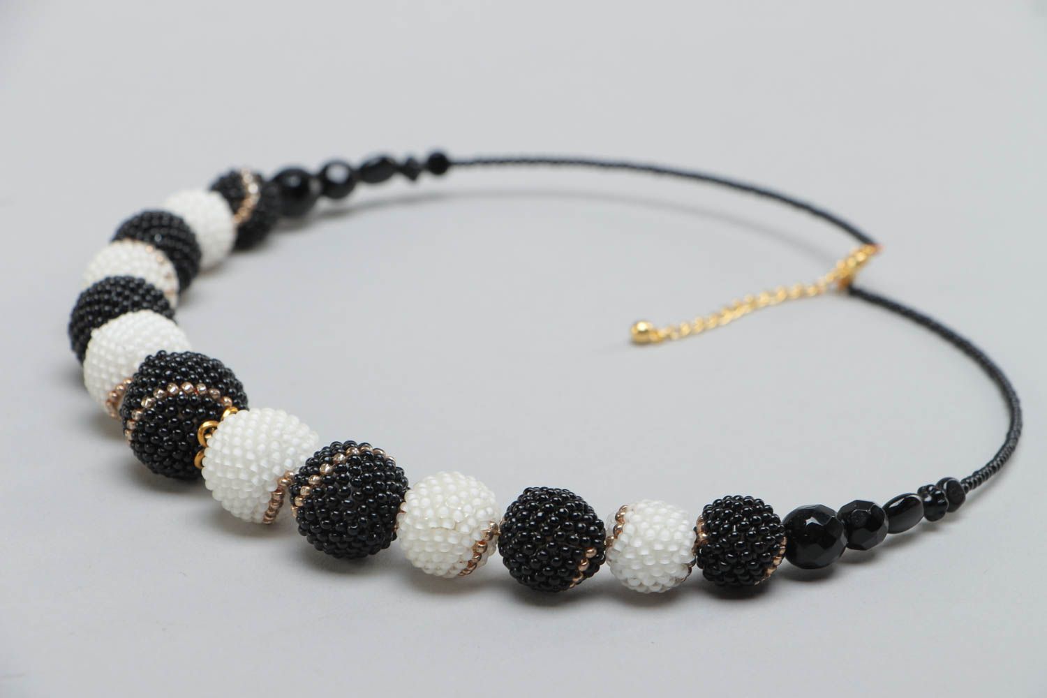 Unusual stylish handmade woven black and white bead necklace photo 3
