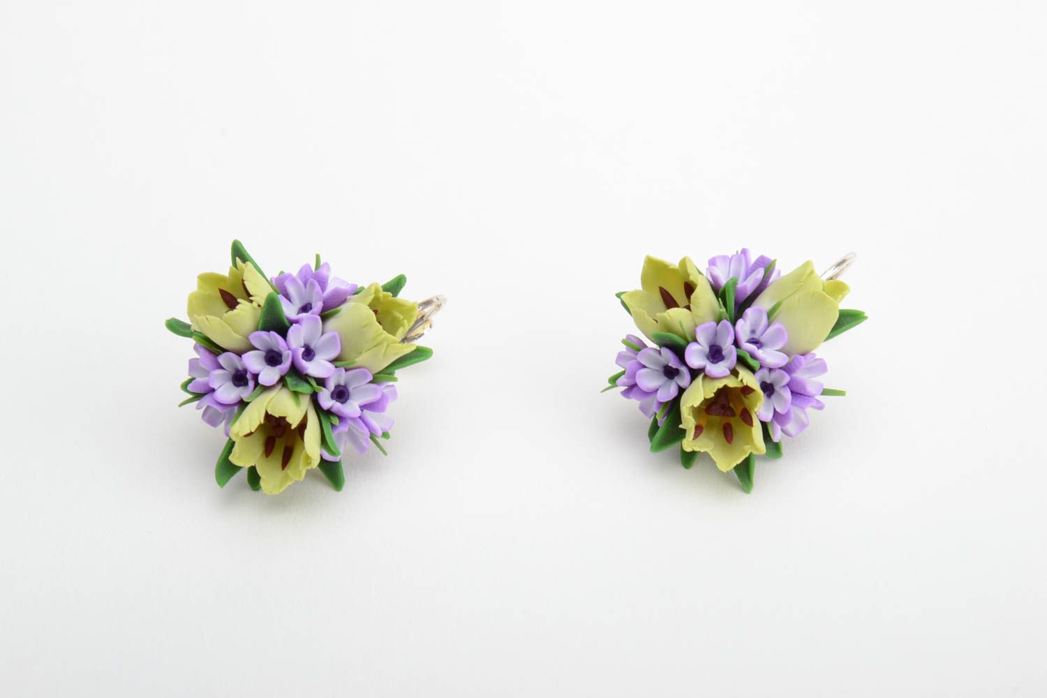 Handmade festive earrings with violet and green polymer clay floral compositions photo 2