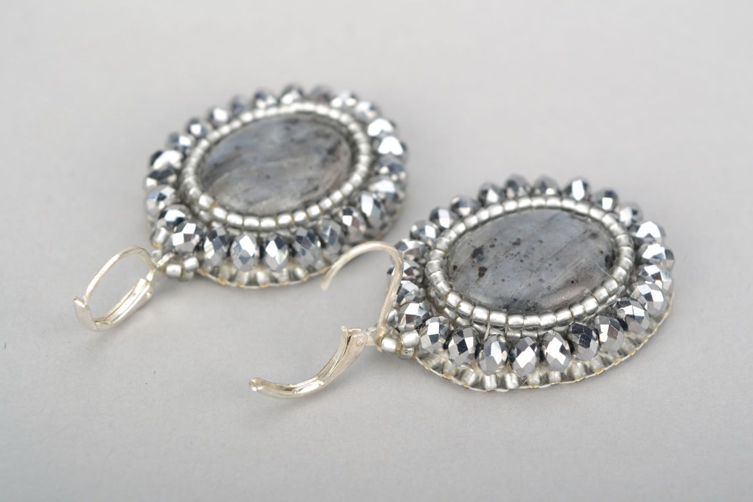 Round earrings with natural stone photo 5