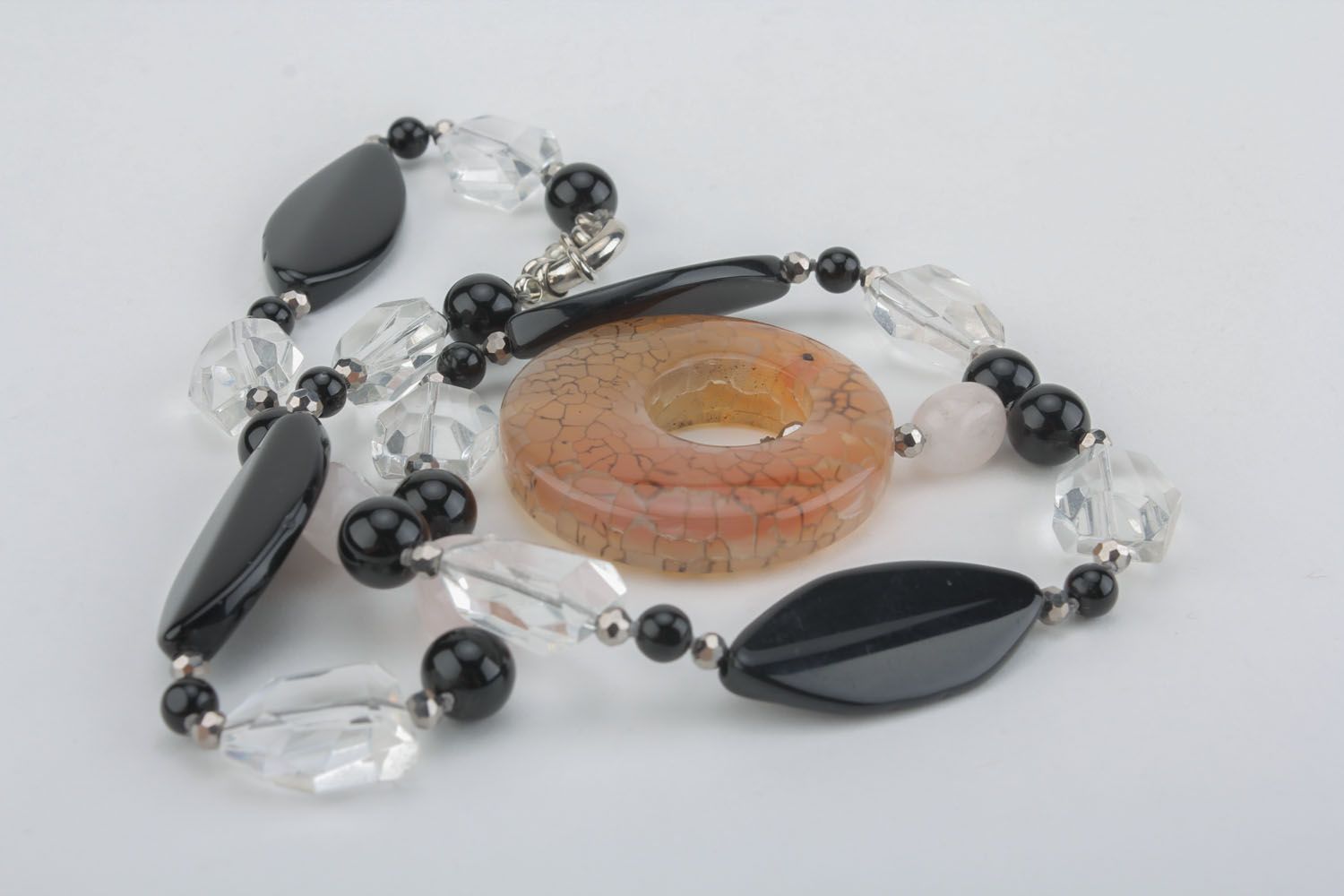 Necklace with a pendant made of natural stones photo 1