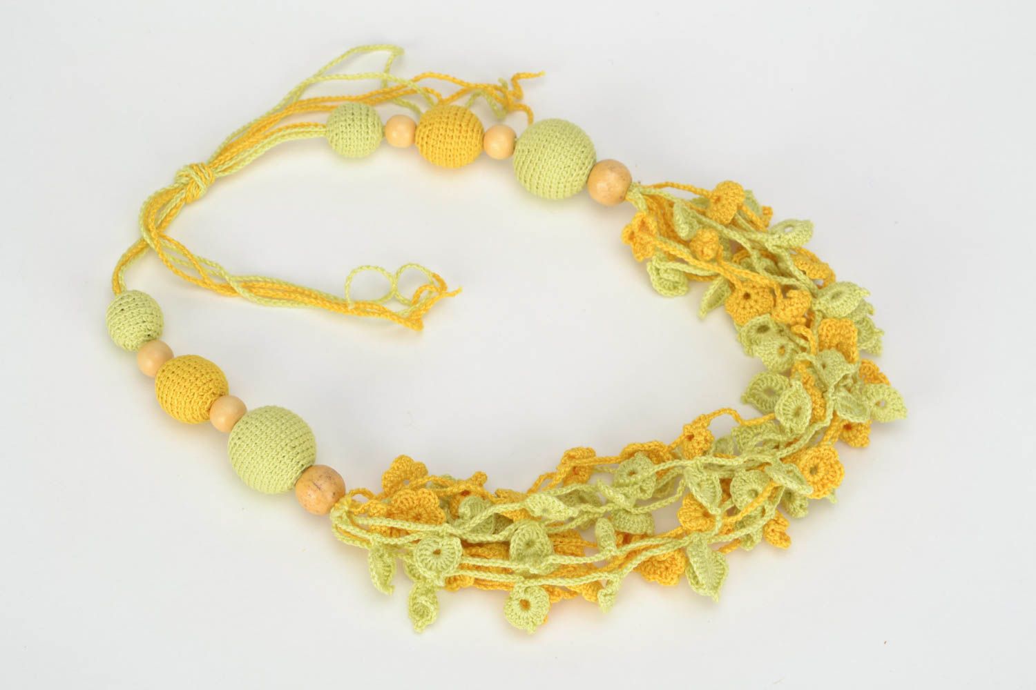 Handmade yellow bead necklace crocheted over with cotton threads with ties photo 2