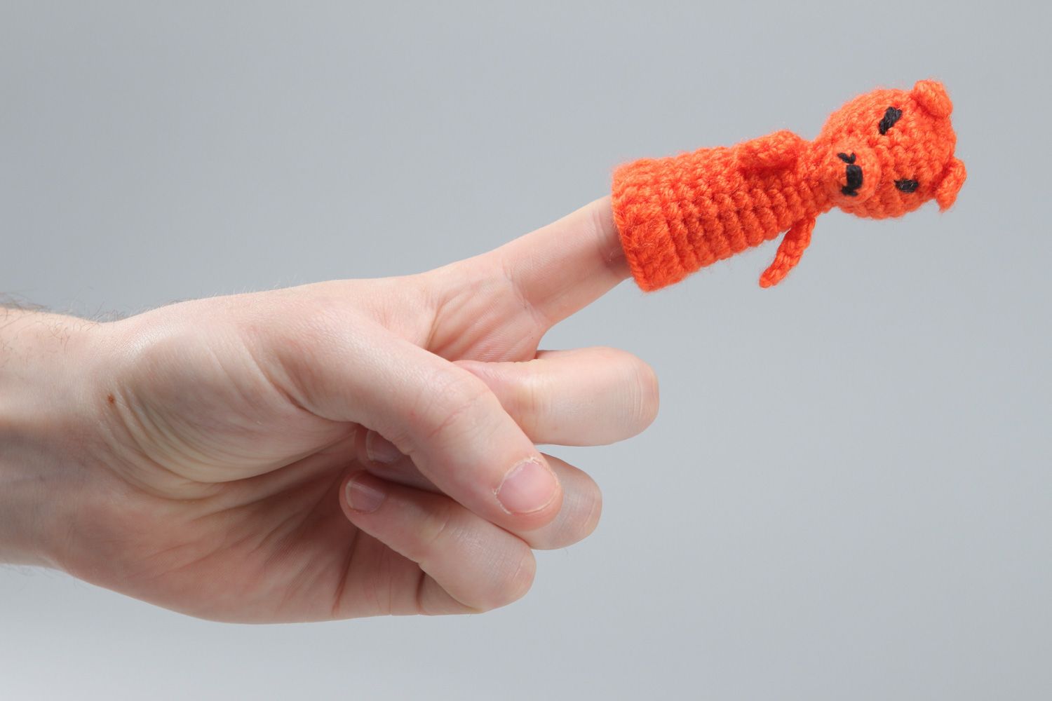 Small handmade finger puppet crocheted of acrylic threads in the shape of red fox photo 4