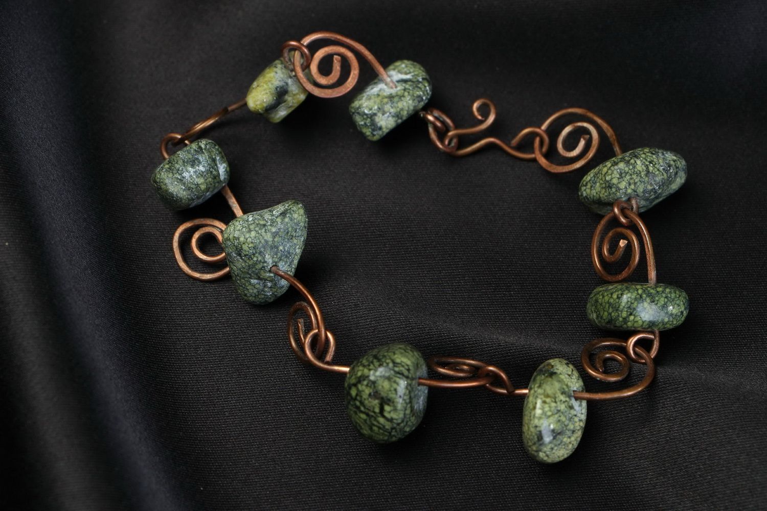 Copper bracelet with a coil stone photo 4