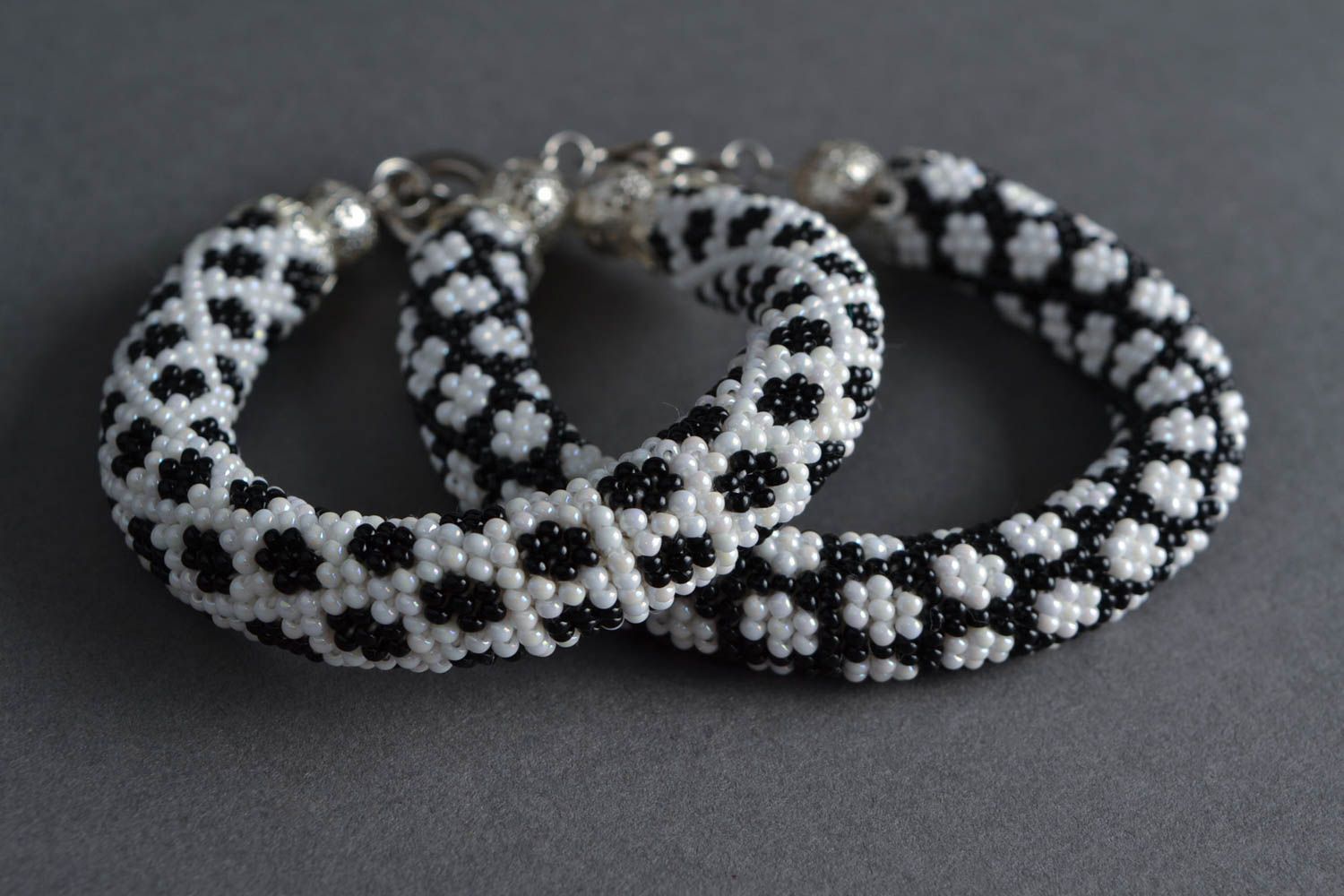 Corded beaded handmade black and white beautiful bracelets set of 2 pieces  photo 1