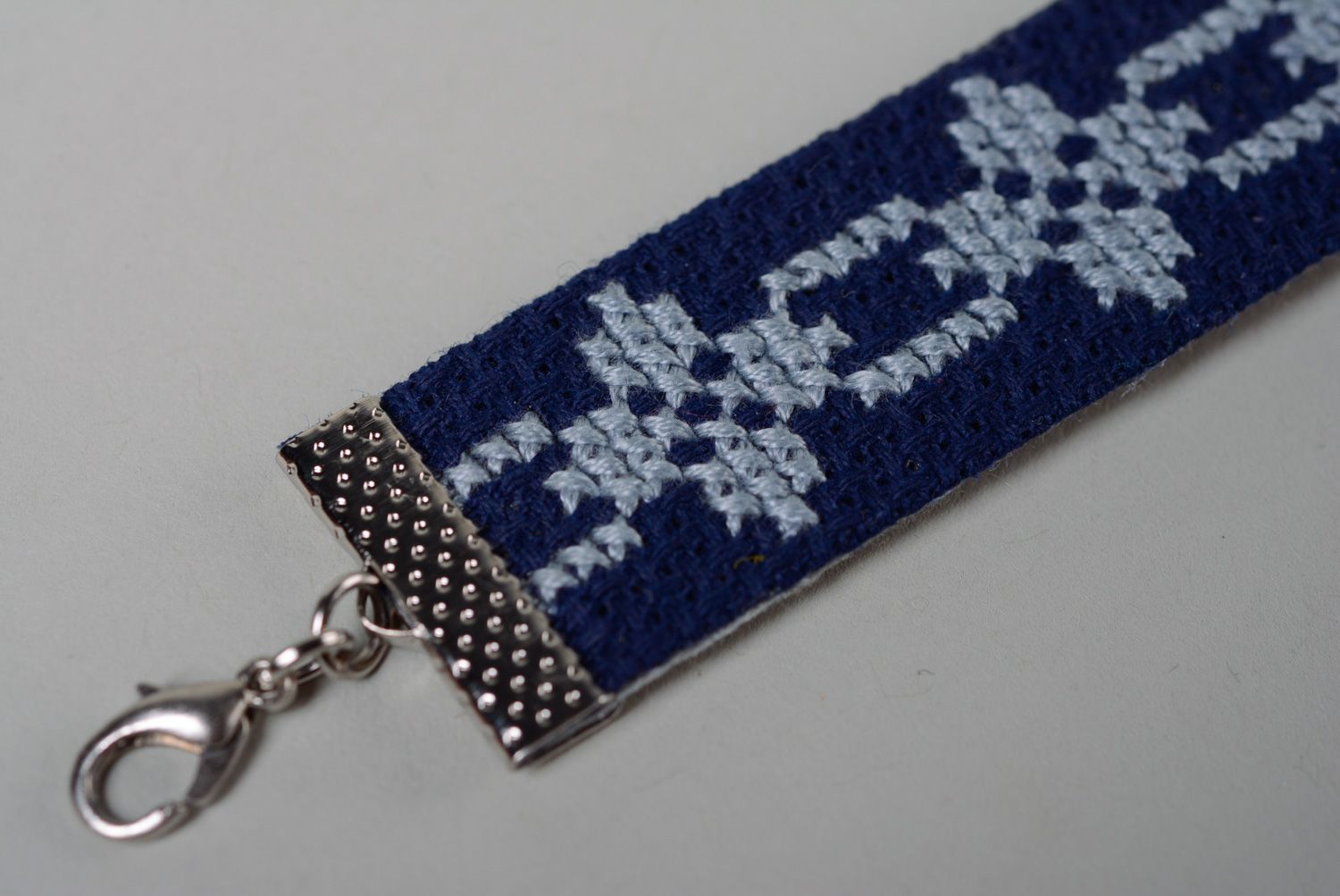 Handmade women's wrist embroidered bracelet in ethnic style in blue color palette  photo 3