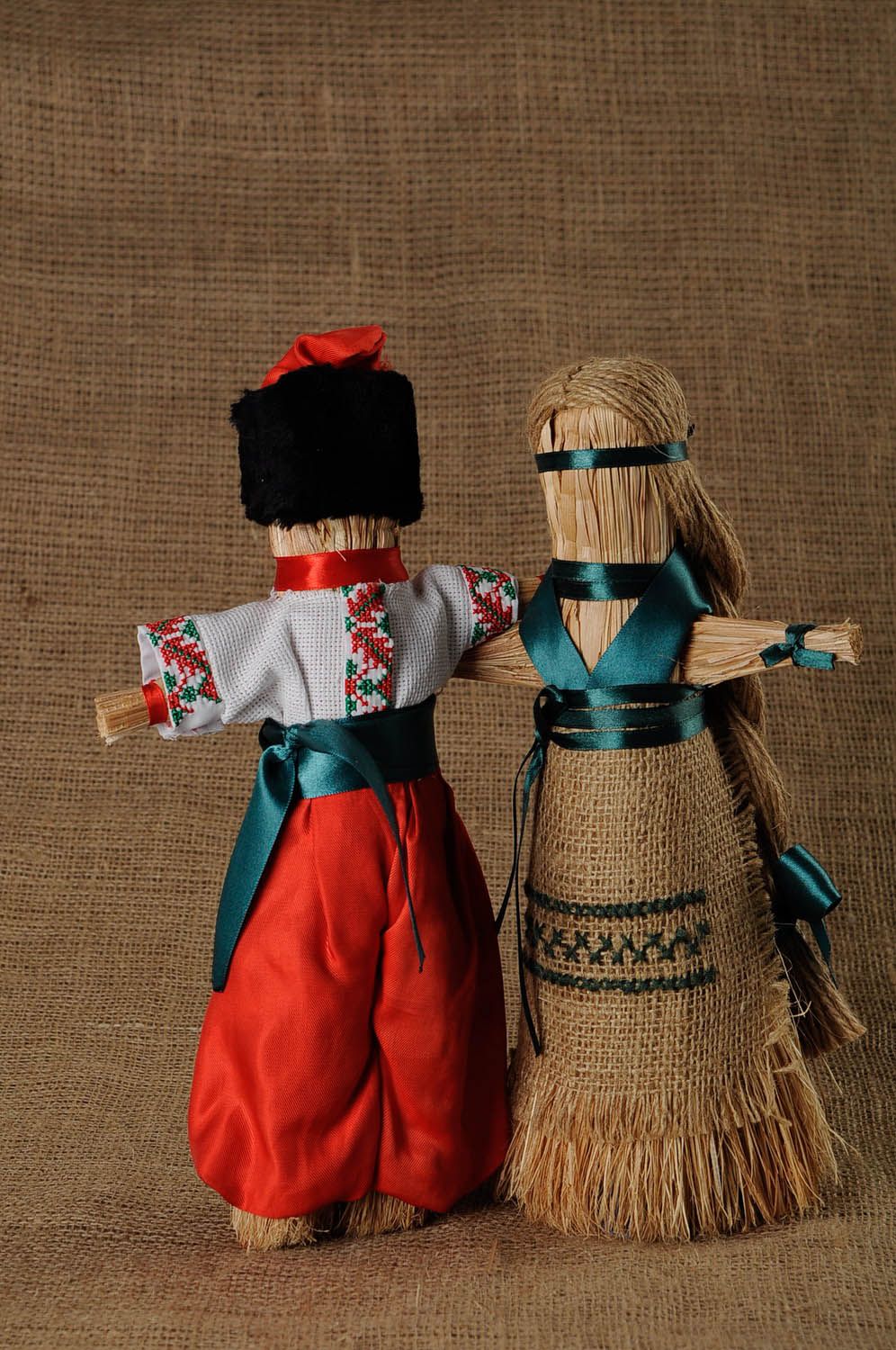 Ethnisches Paar von Puppen-Amuletten foto 1