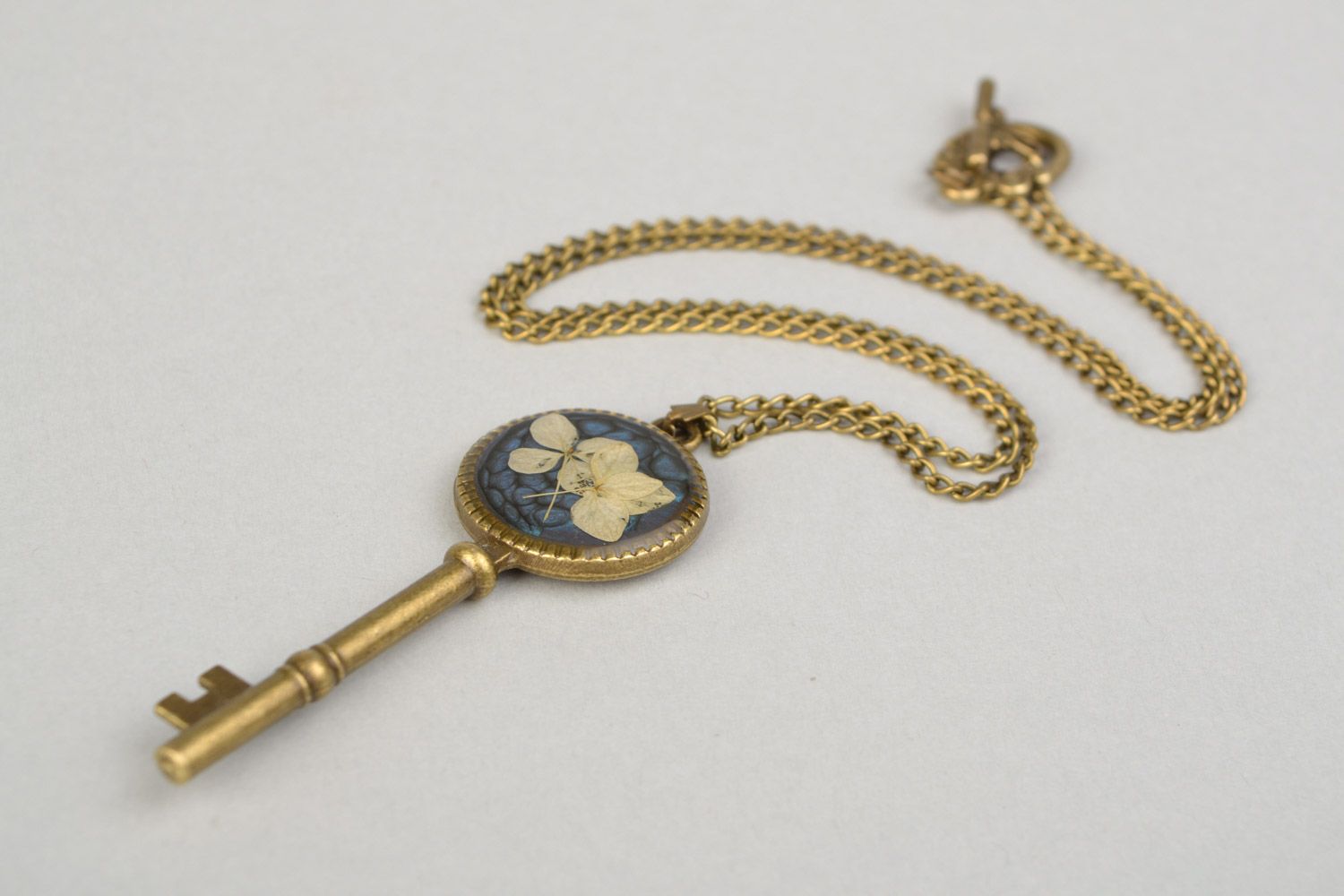 Handmade botanical pendant on long chain with hydrangeas flower coated with epoxy photo 5