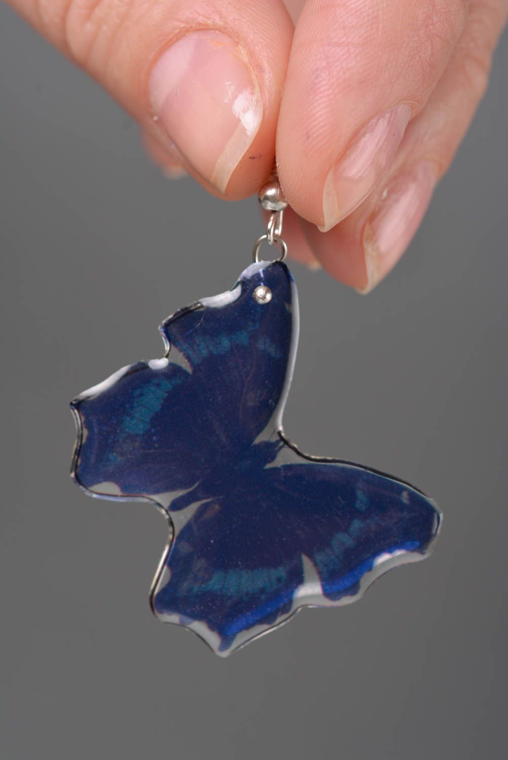 Unusual handmade blue butterfly shaped earrings coated with epoxy resin photo 2