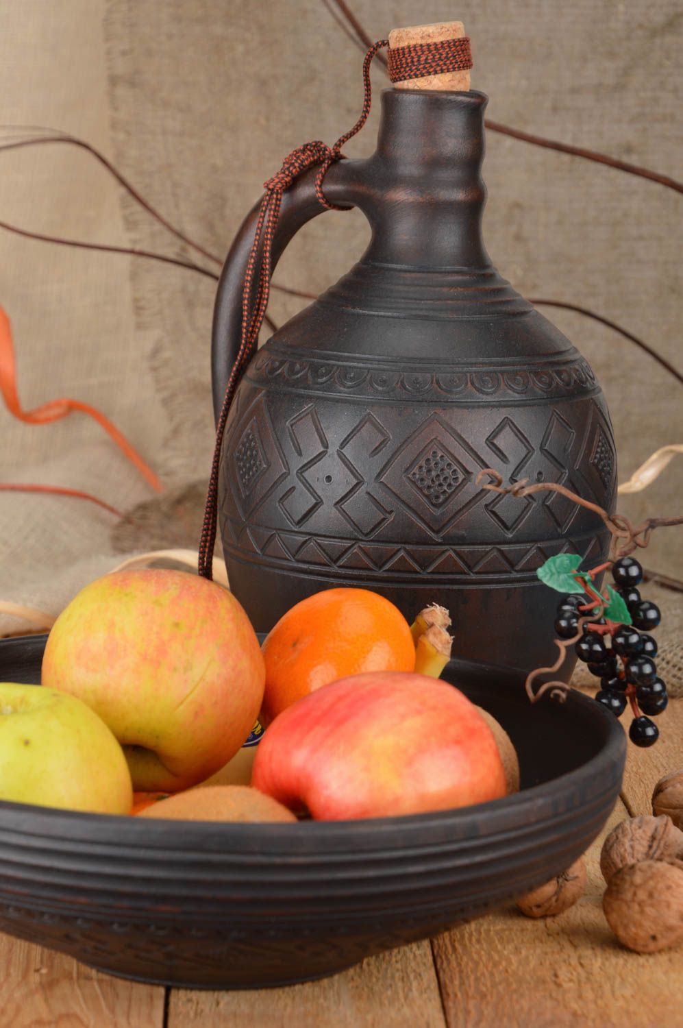 Set of handmade pottery kitchenware dark ceramic bottle with cork and fruit bowl photo 1