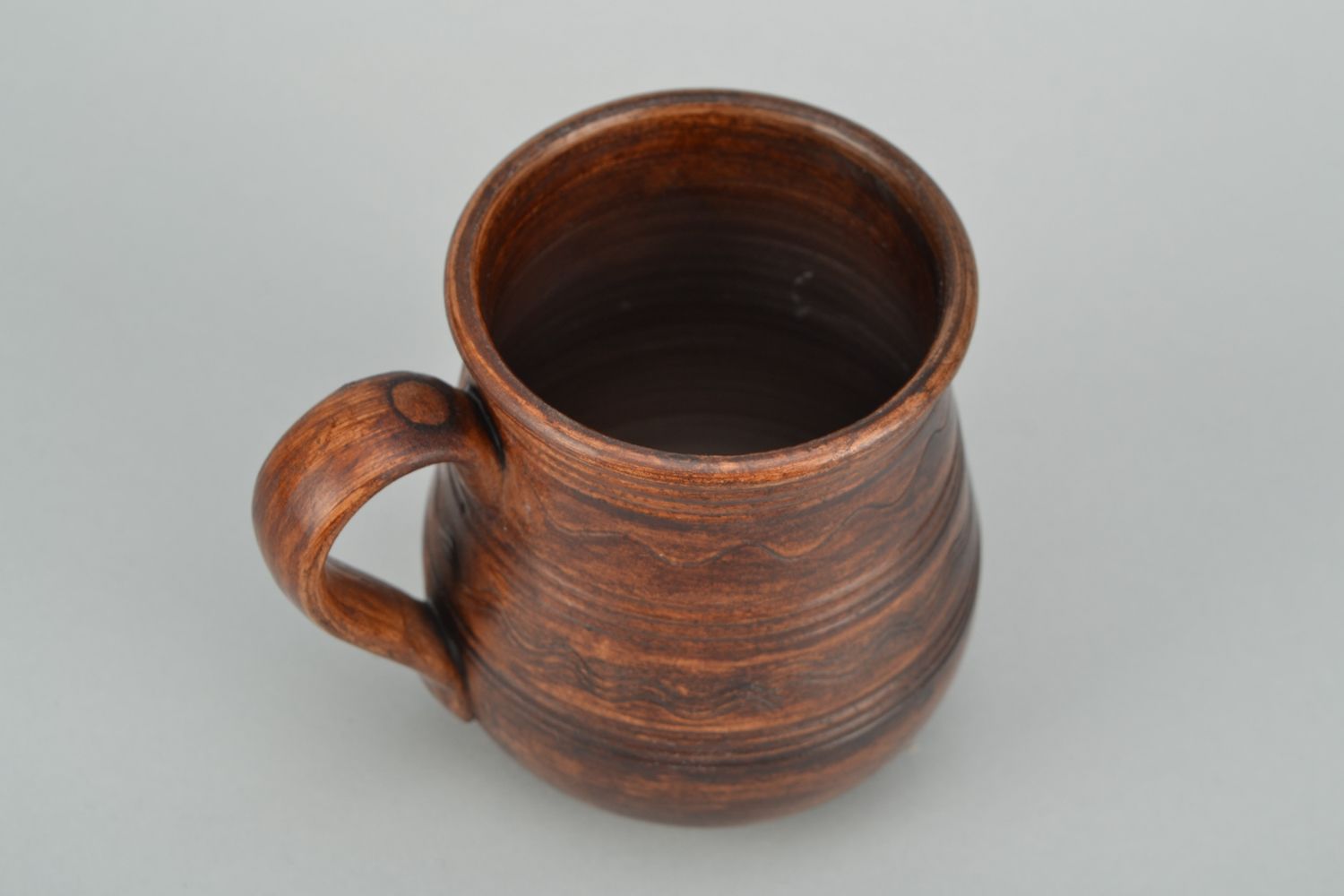 11 oz clay glazed coffee cup in rustic design with handle and no pattern photo 4