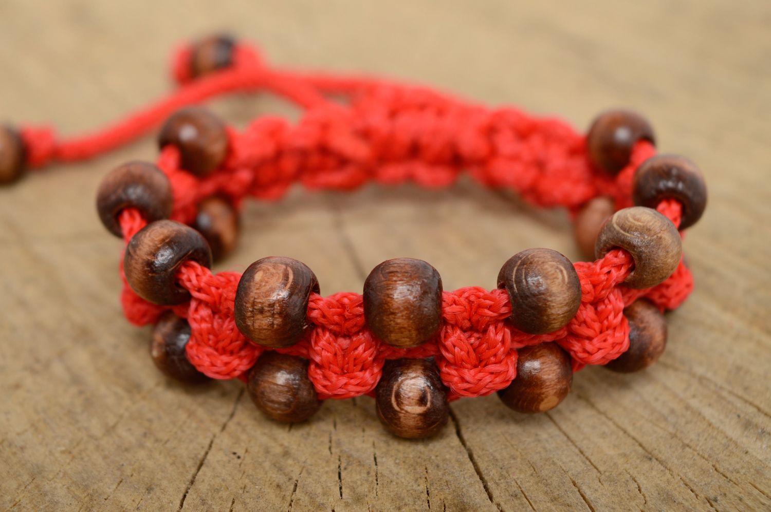 Macrame friendship bracelet with polyester cord and wooden beads photo 1