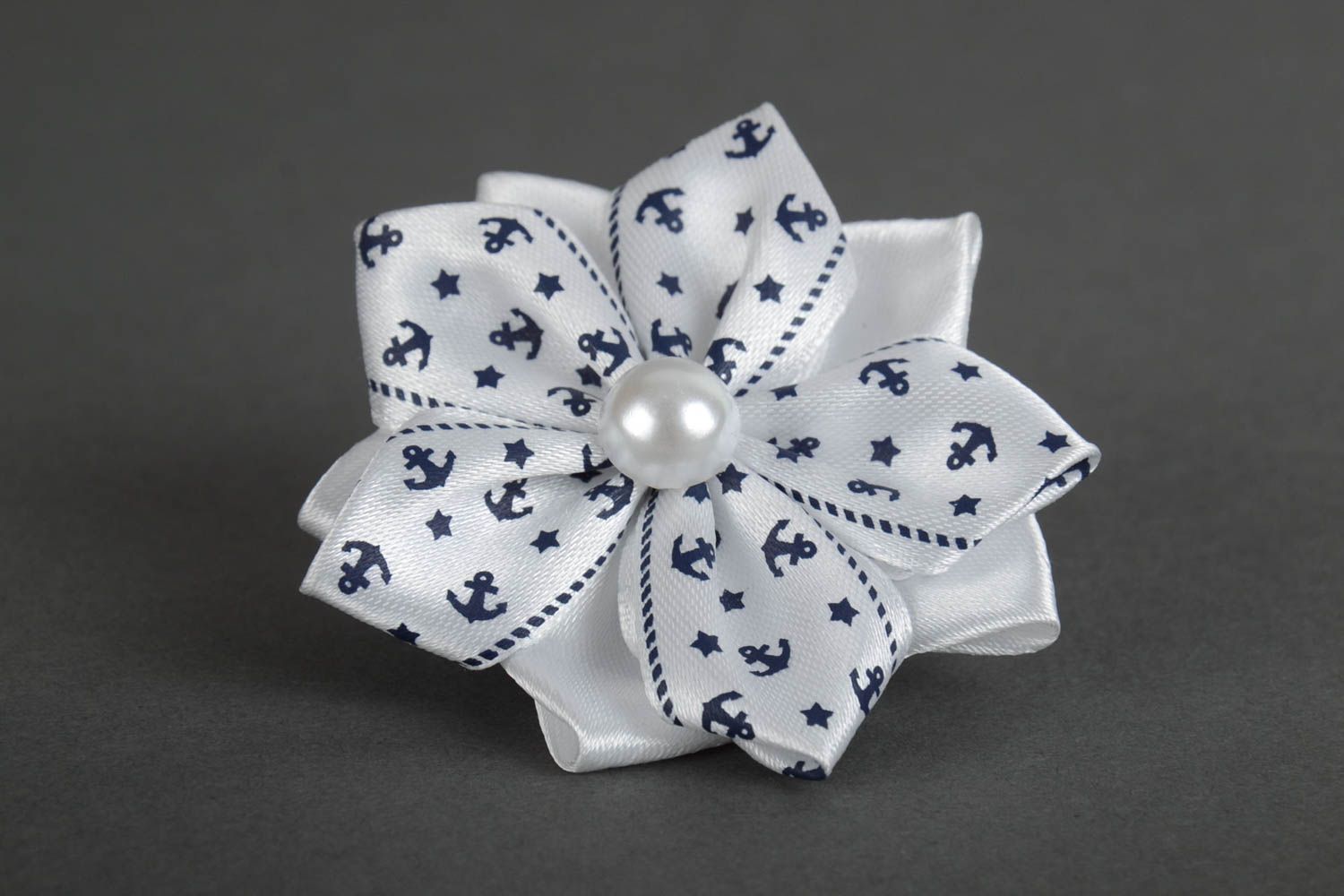 Handmade hair tie with kanzashi flower folded of white and patterned ribbons photo 2