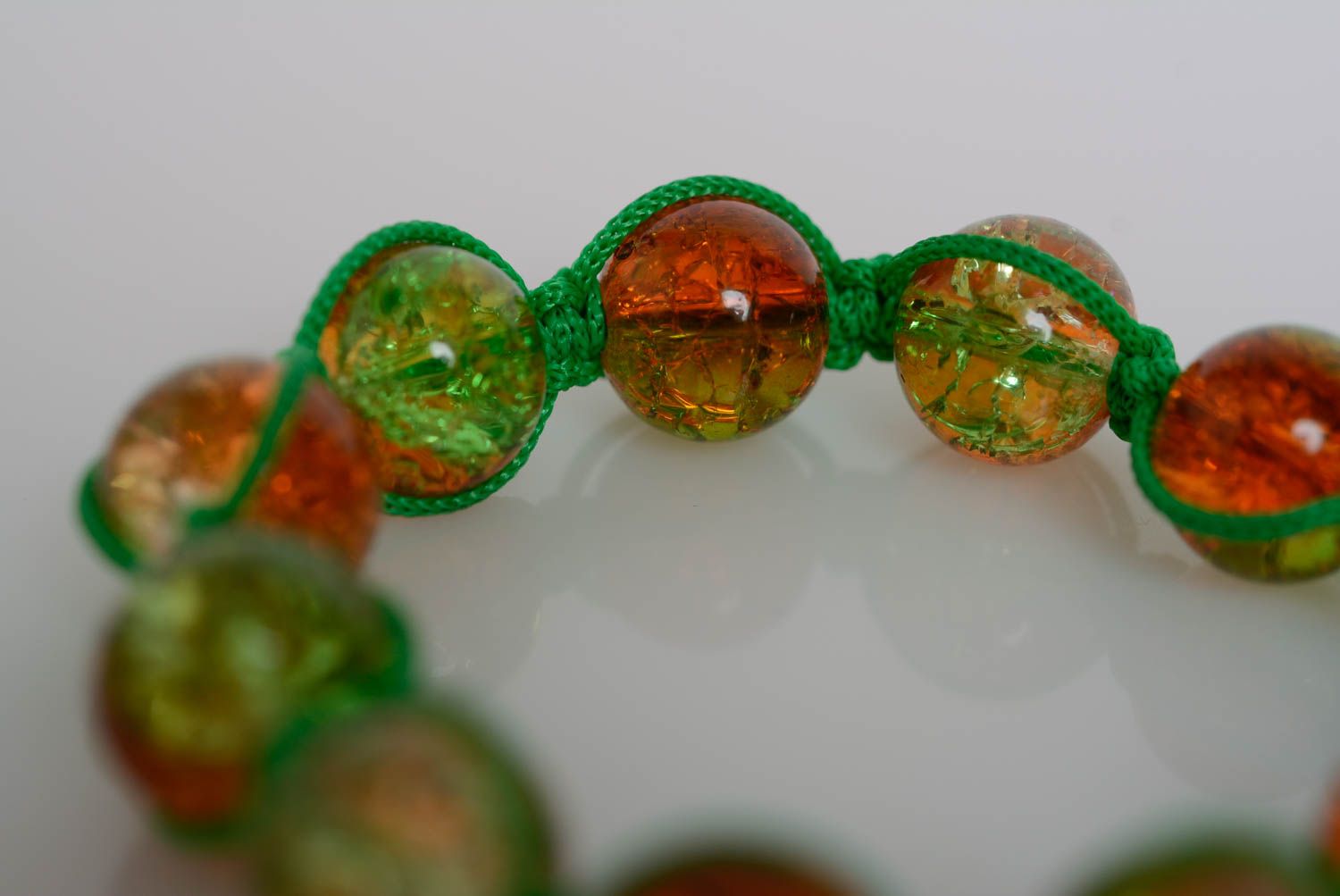 Handmade bracelet made of plastic beads on waxed cord braided green accessory photo 2