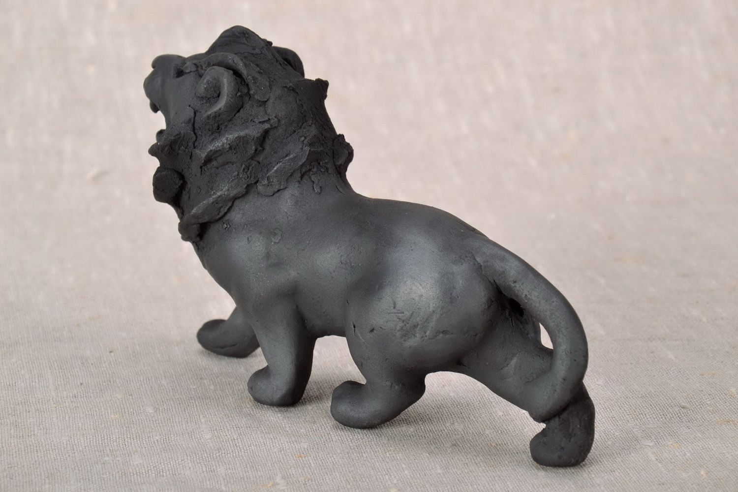 Statuette made from linden wood Lion photo 1