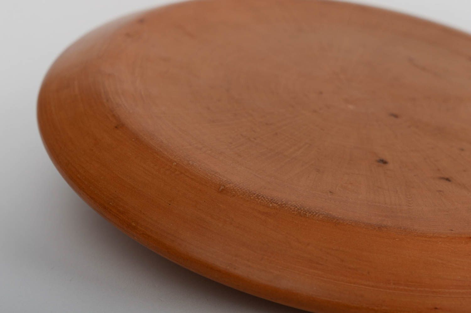 Assiette en argile faite main brune design original rond poterie en terre cuite photo 4