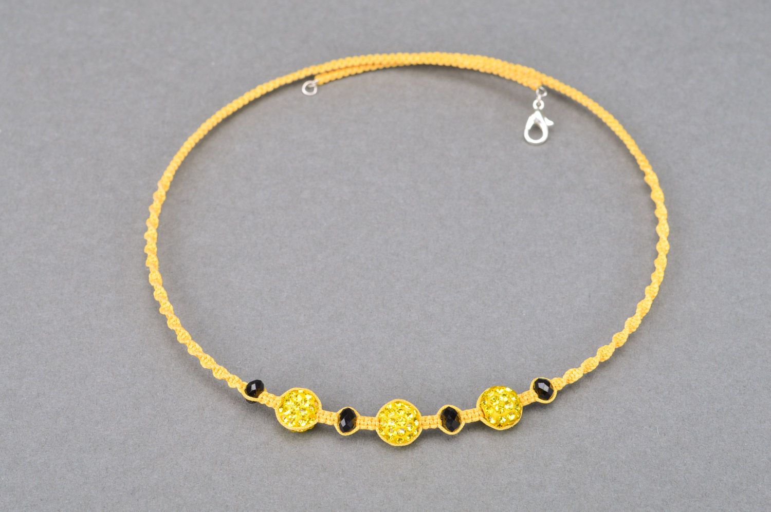 Unusual design handmade necklace woven of threads and beads of yellow color for girls photo 2