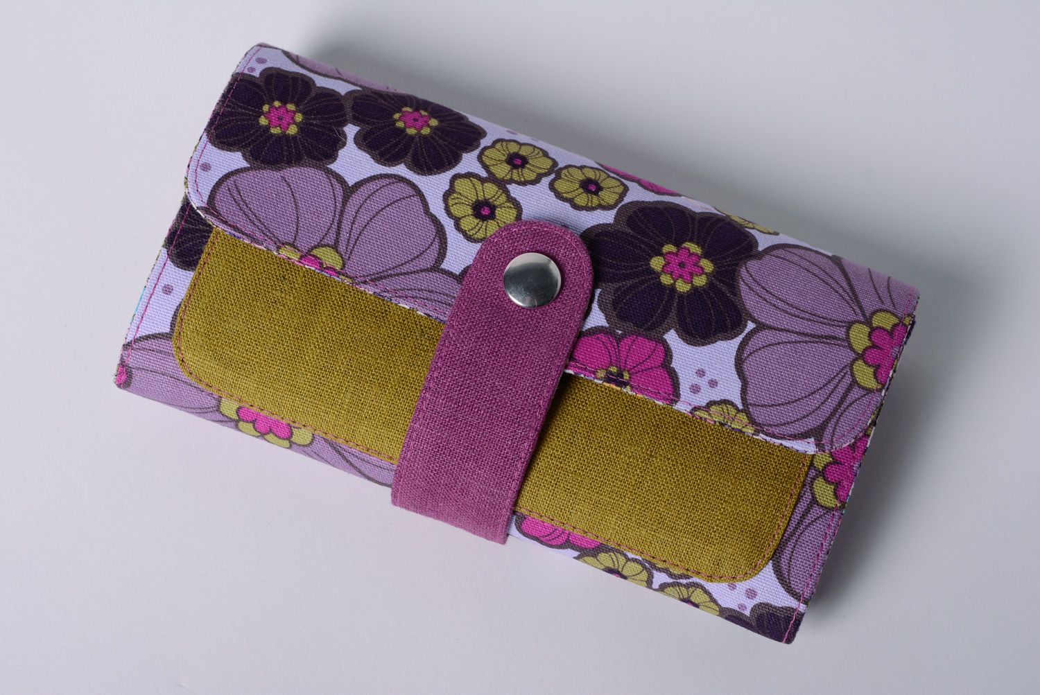 Handmade wallet sewn of cotton and linen fabrics with floral pattern with stud photo 1