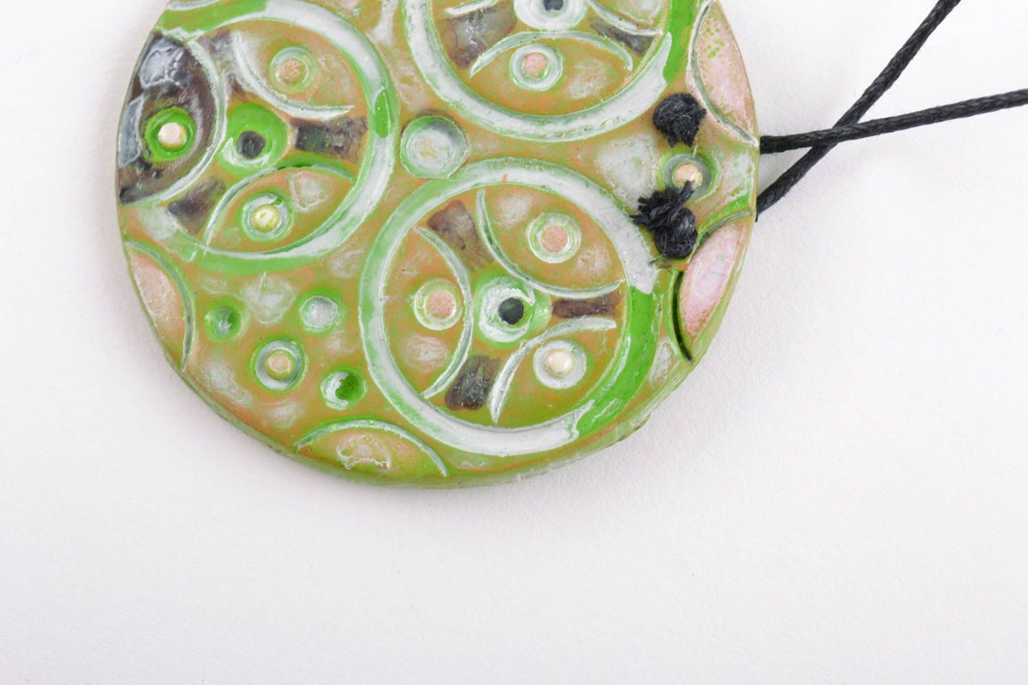 Handmade women's round ceramic pendant of bright green color with ornament photo 3