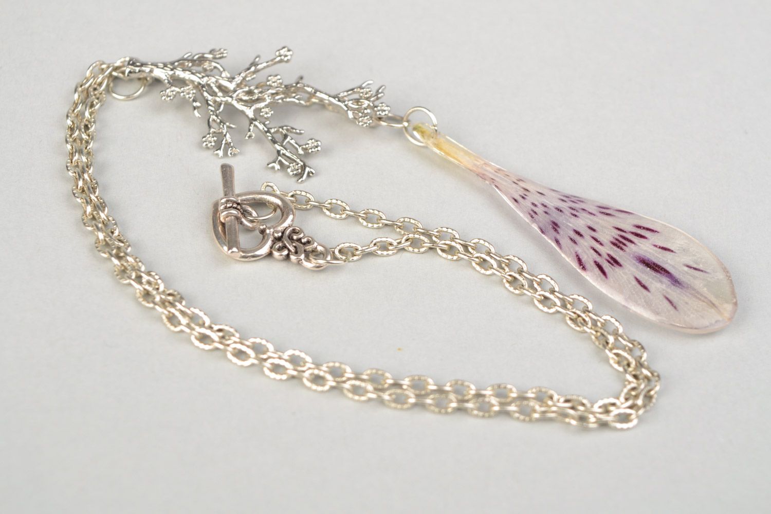 Elegant handmade pendant with alstroemeria petal in epoxy resin on metal chain photo 4