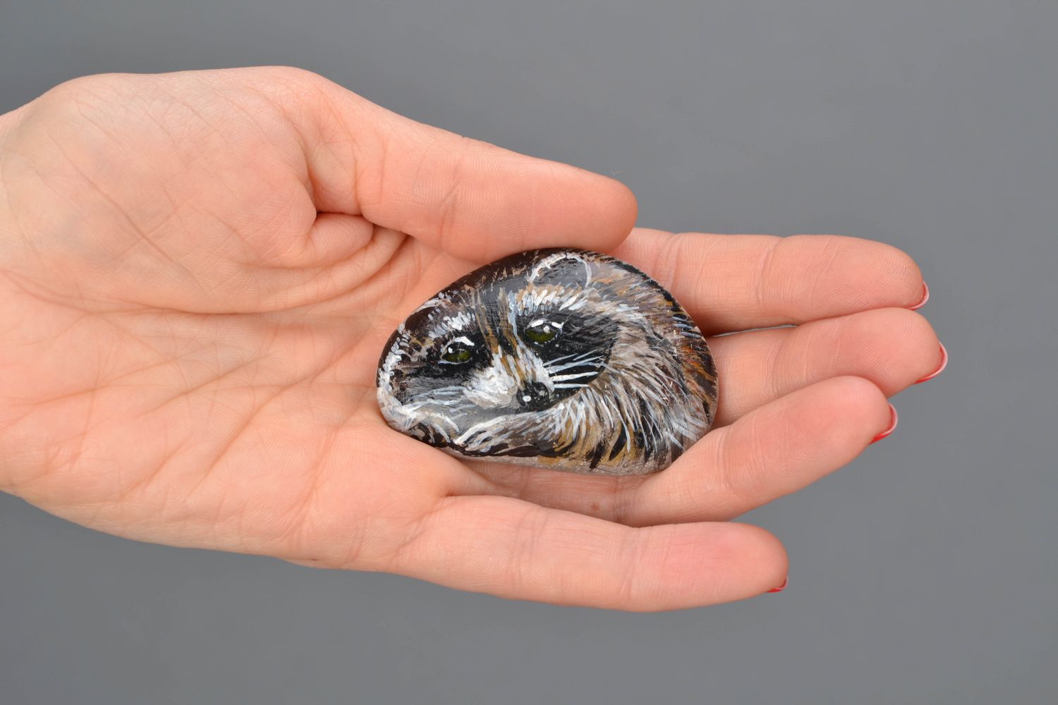 Small painted sea stone for decor Raccoon photo 1