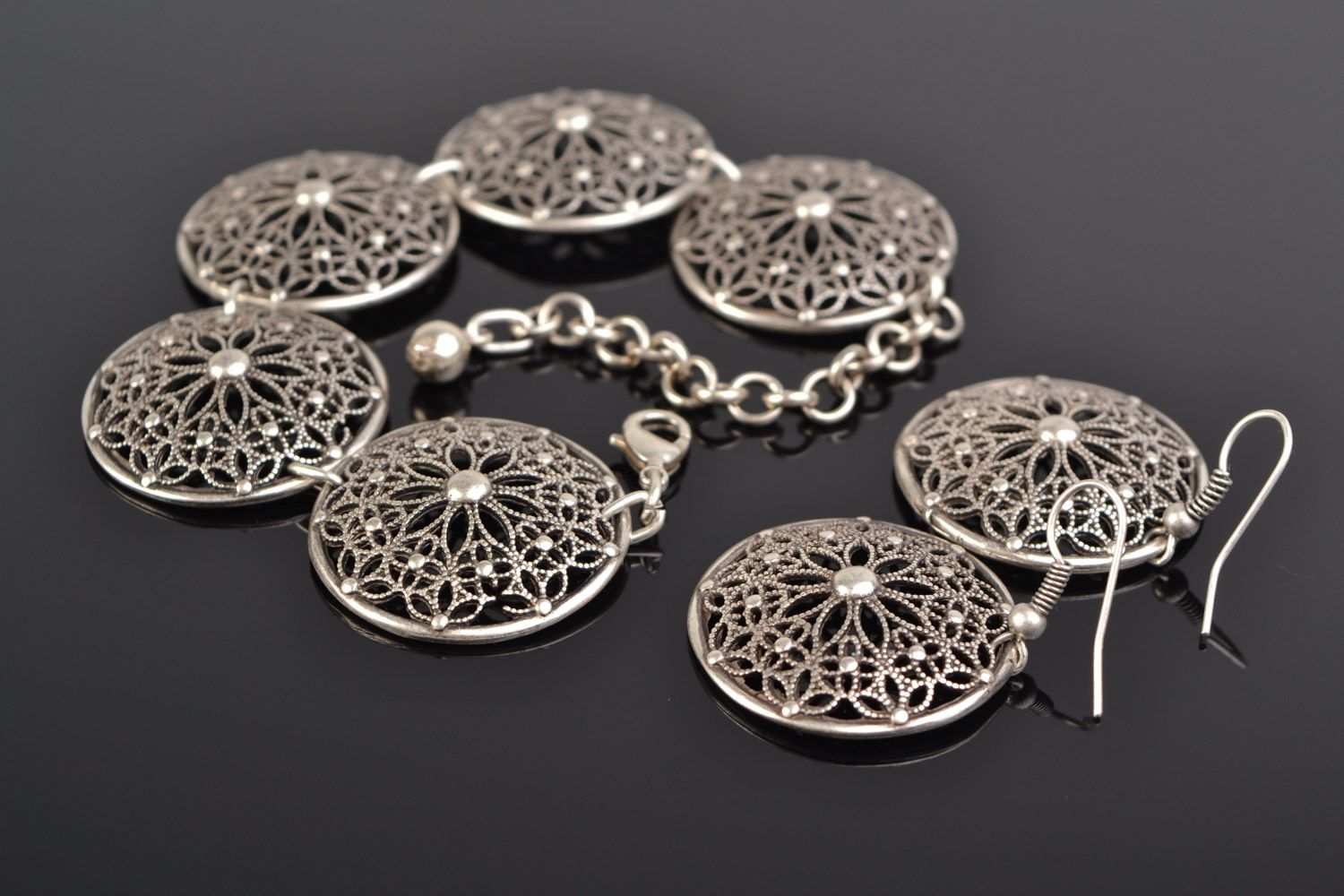 Set of handmade hypoallergenic metal wrist bracelet and dangling earrings photo 1