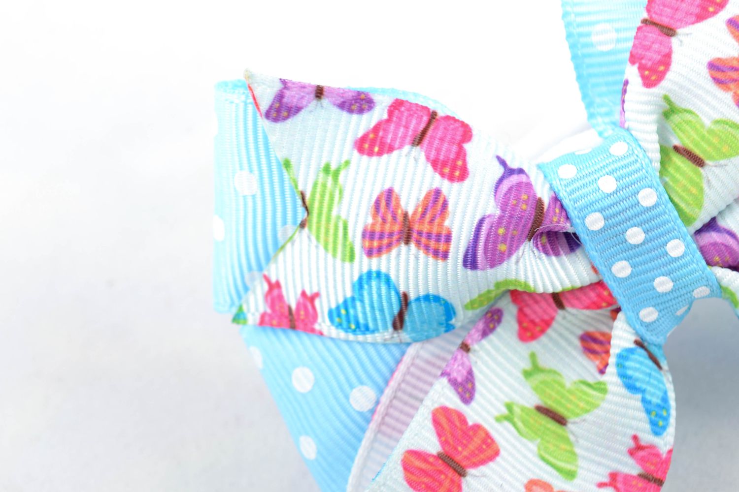 Hair ties with bows made of blue rep ribbons with floral print photo 2