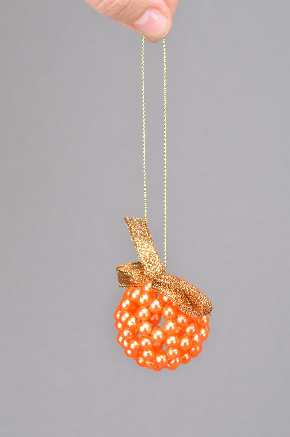 Handmade woven beaded interior pendant ball of orange color with eyelet photo 3