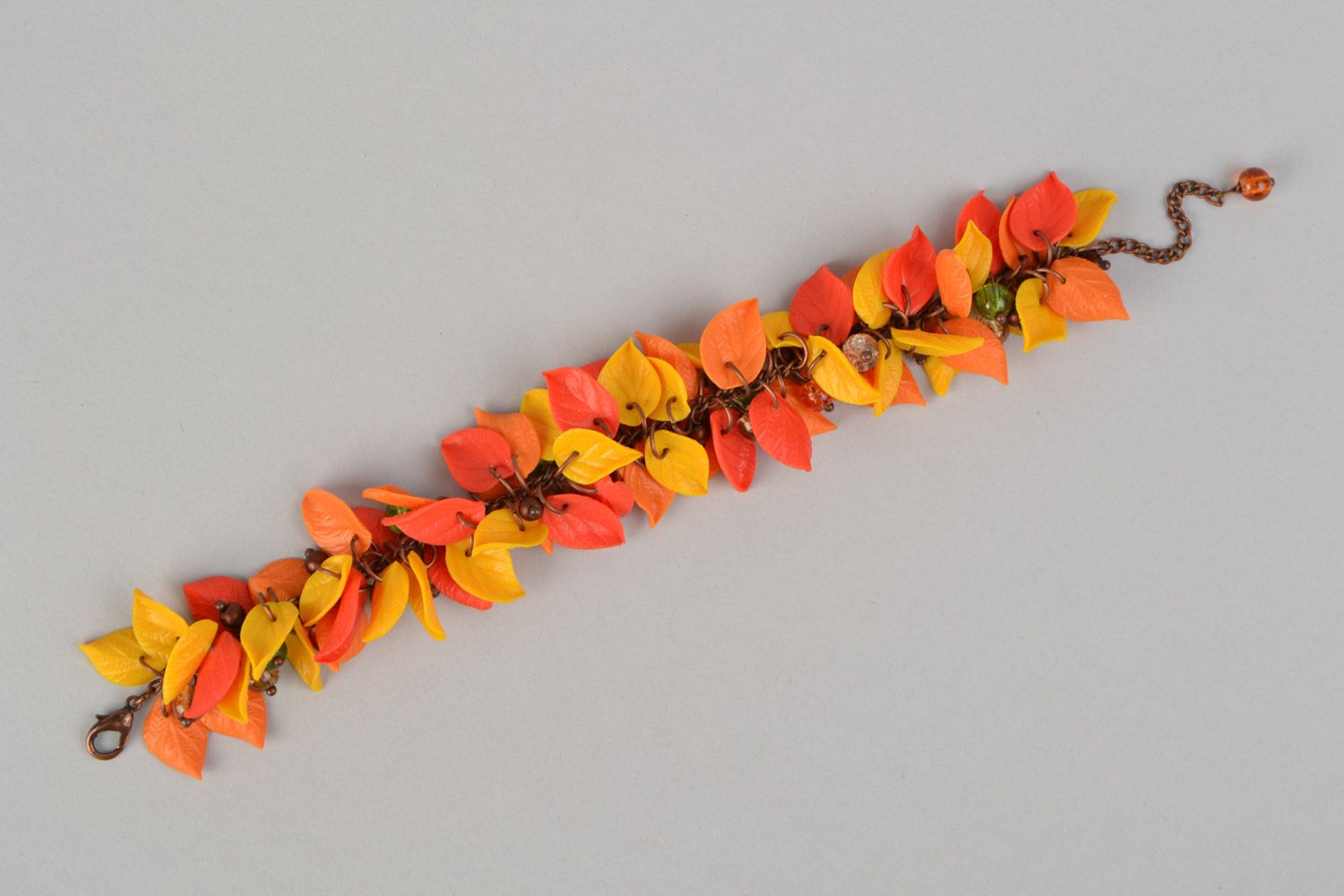 Handmade metal chain wrist bracelet with polymer clay leaves in autumn colors photo 2