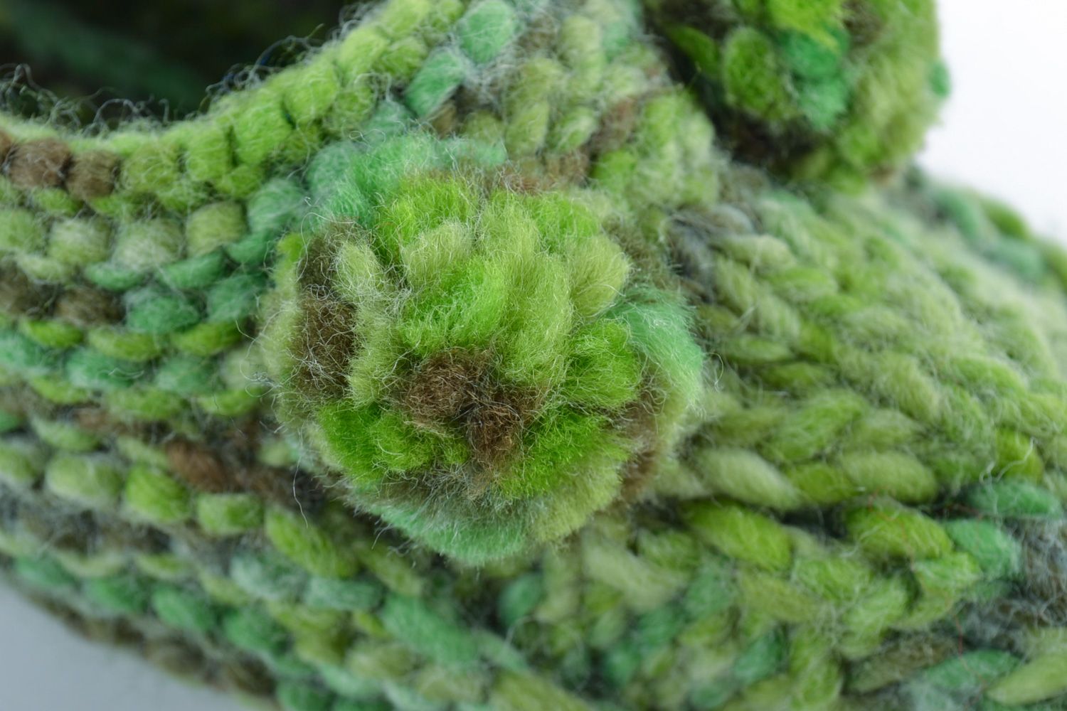 Handmade knitted half-woolen house slippers with pompoms of green color photo 3