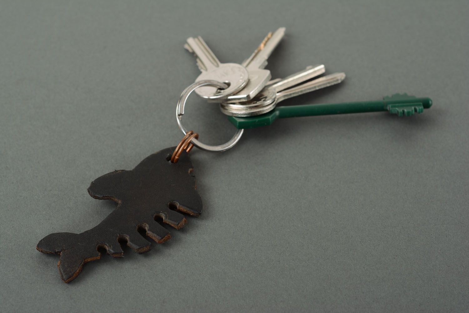Leather keychain in the shape of shark photo 1