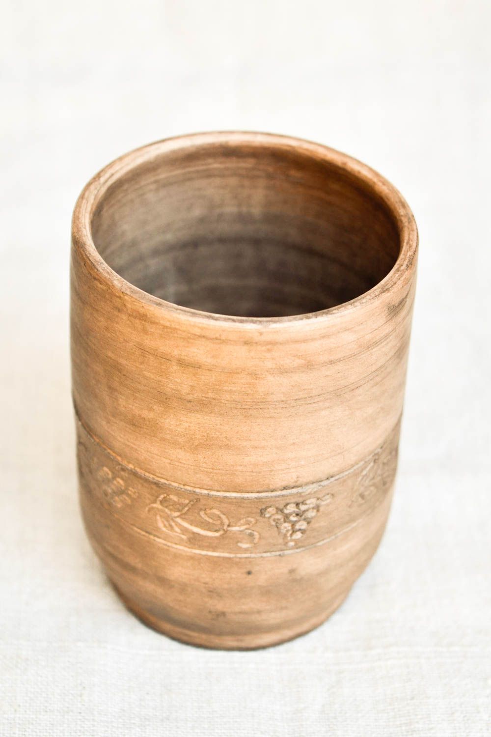 Tall 10 oz clay rustic cup with no handle with plain floral pattern photo 4