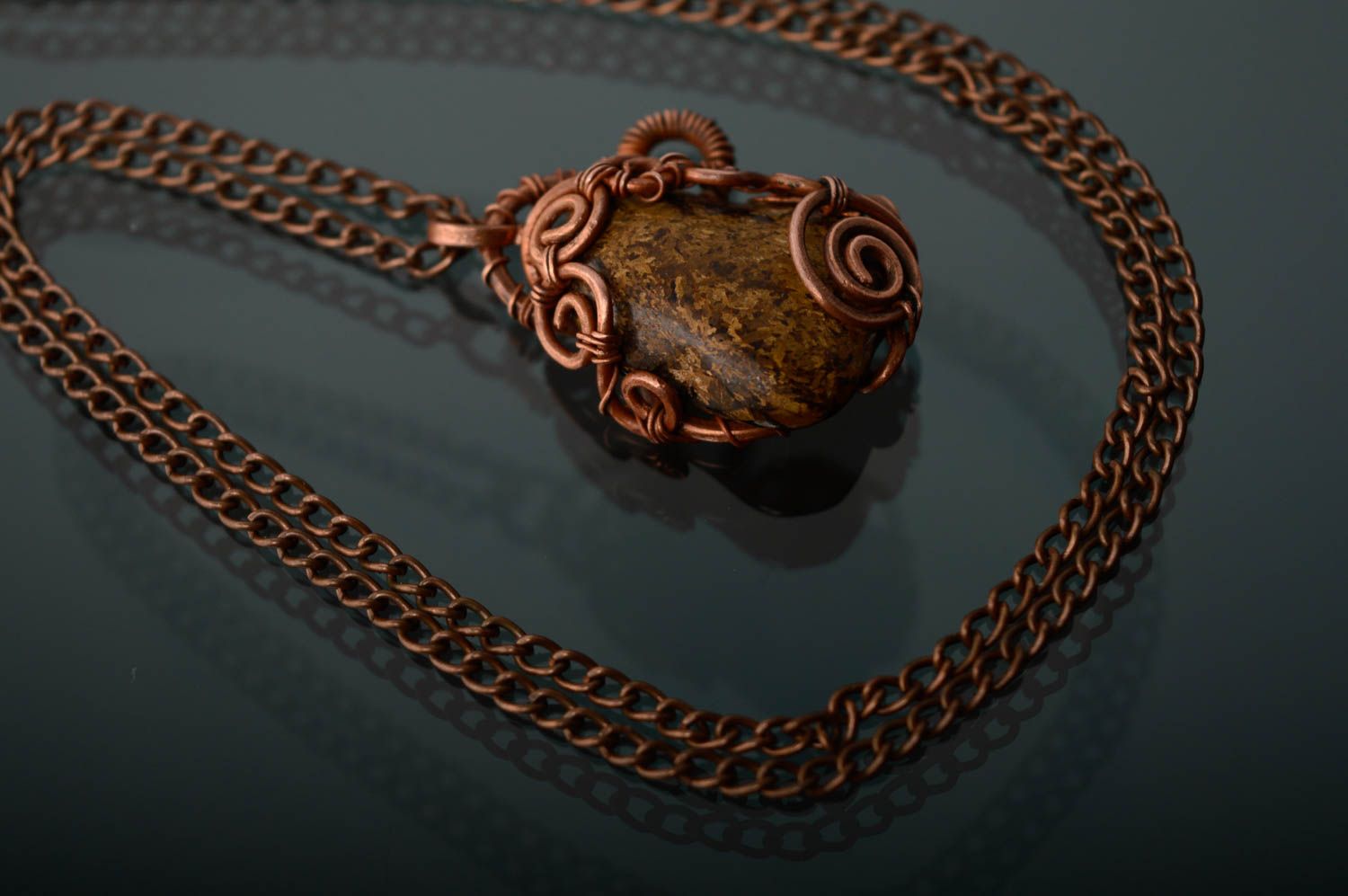 Copper pendant with natural bronzite stone photo 5