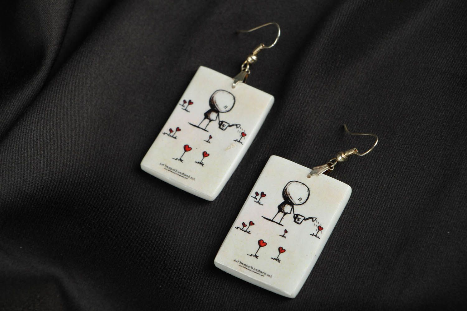 Earrings with romantic drawing photo 1