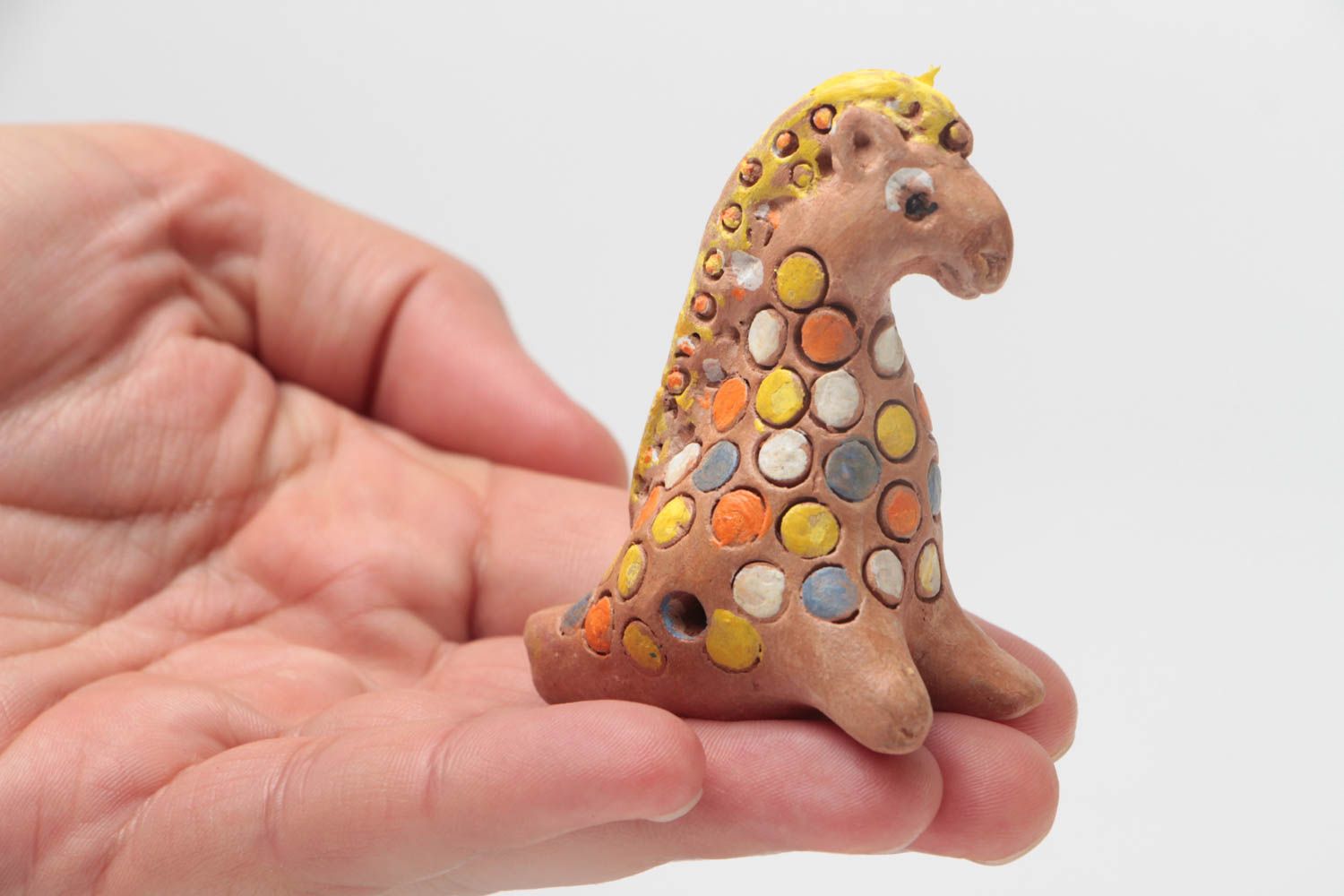 Folk eco friendly toy whistle in the form of horse made of clay with painting photo 5