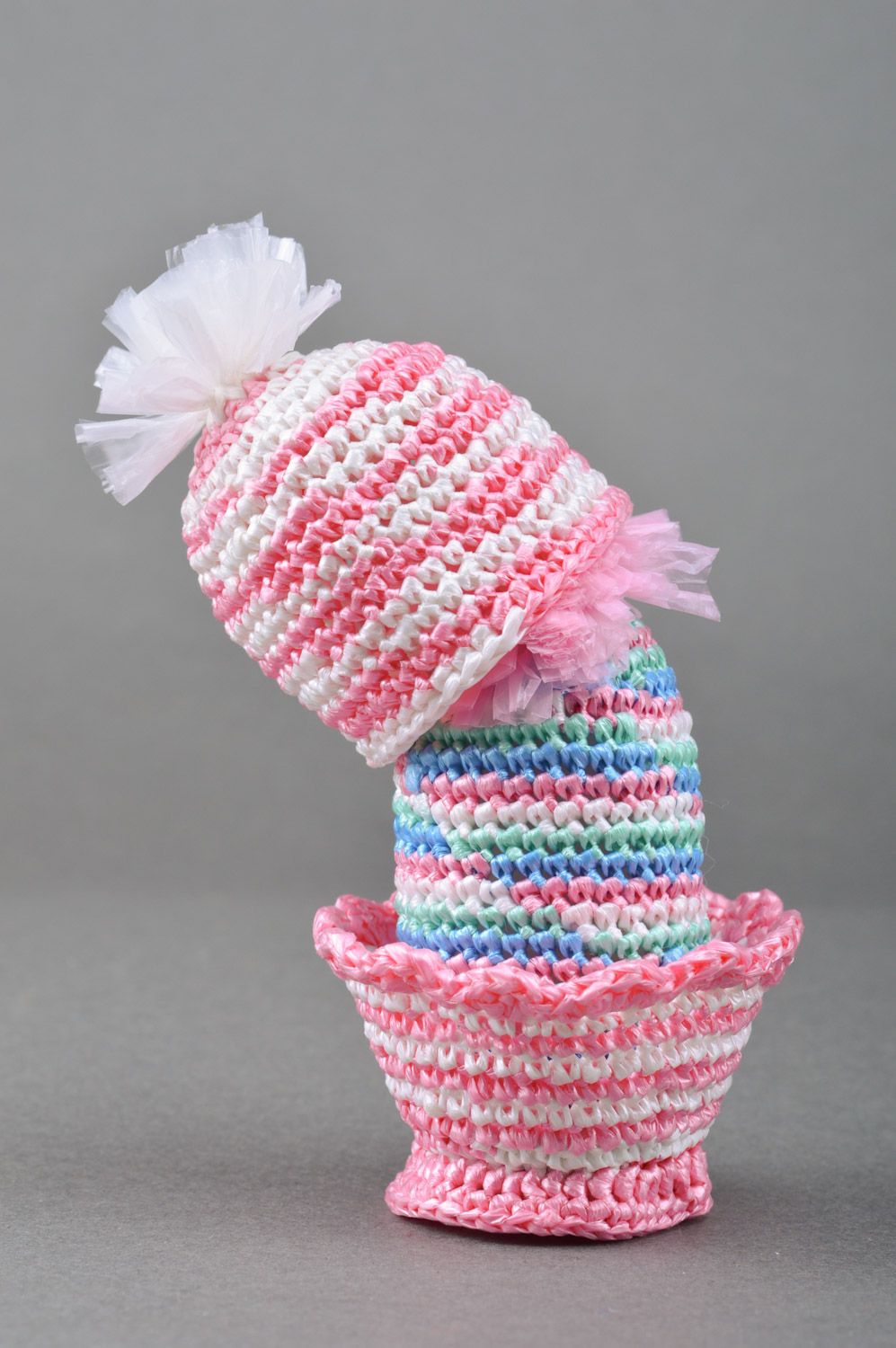 Handmade decorative Easter egg crocheted of pink threads on stand and cover photo 5