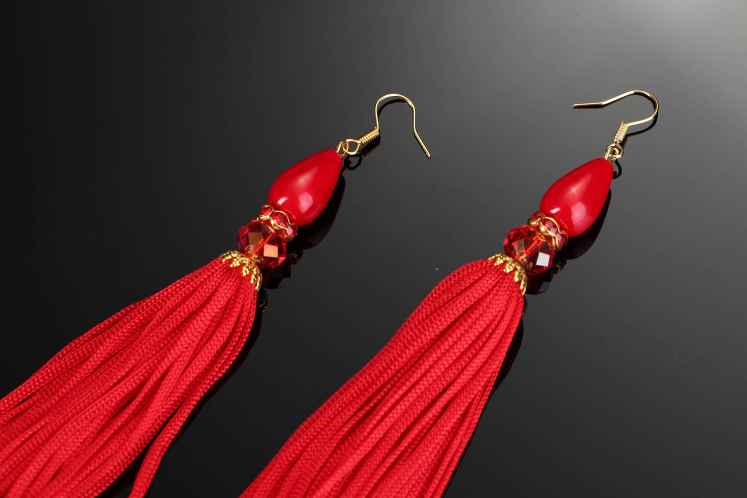 Red earrings made of fluorescent fringe photo 2