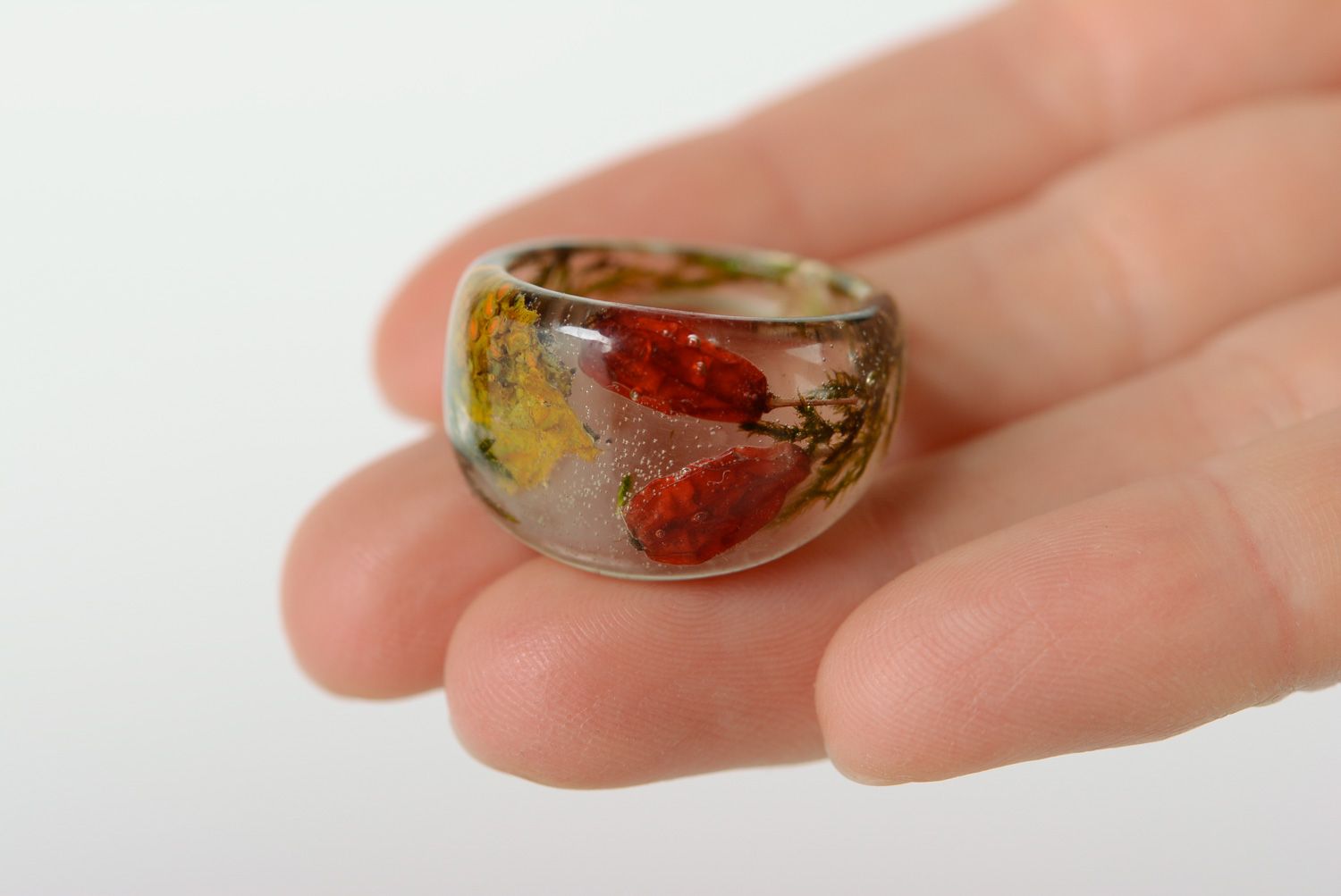 Unusual handmade transparent ring with barberry and moss coated with epoxy resin photo 4