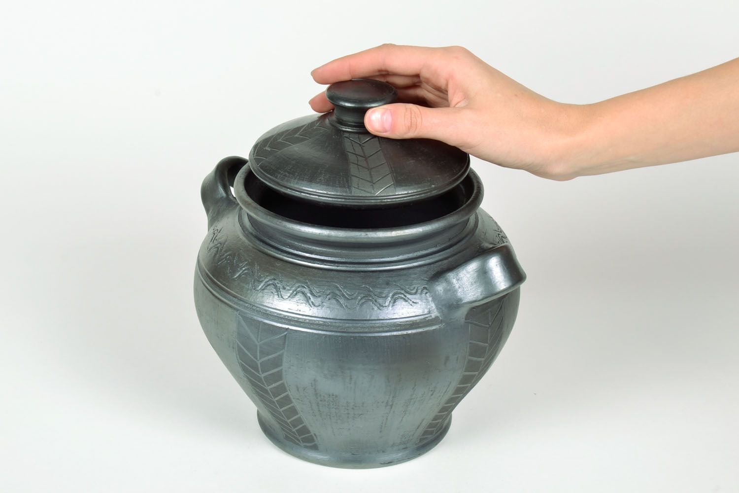 Smoke fired ceramic pot with a lid photo 5