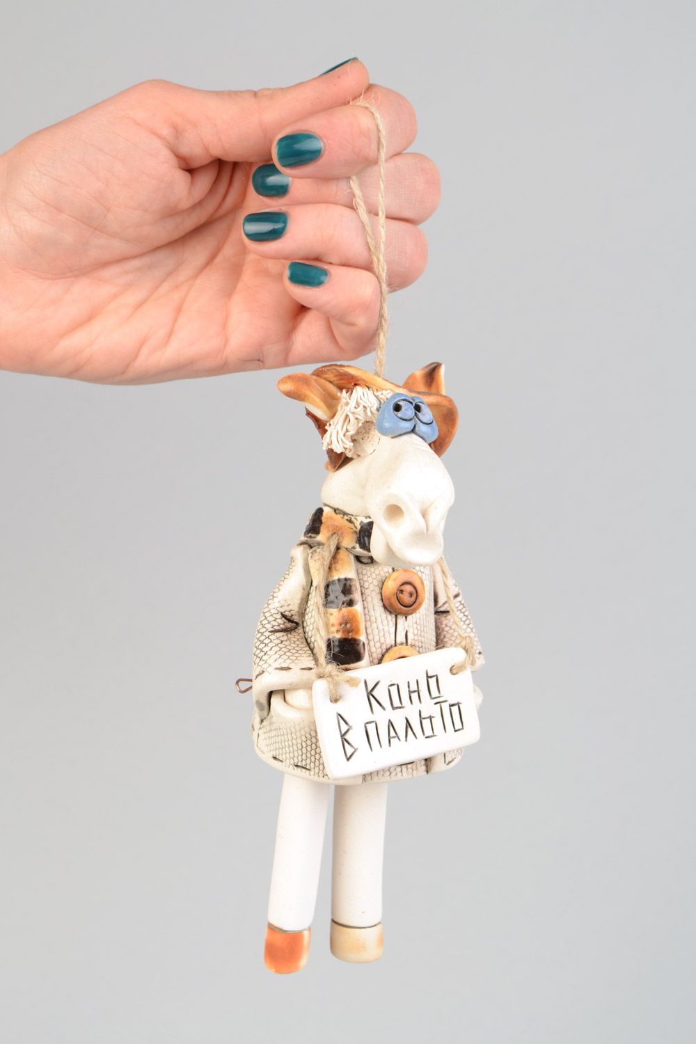 Handmade designer ceramic bell in the shape of horse in coat photo 1