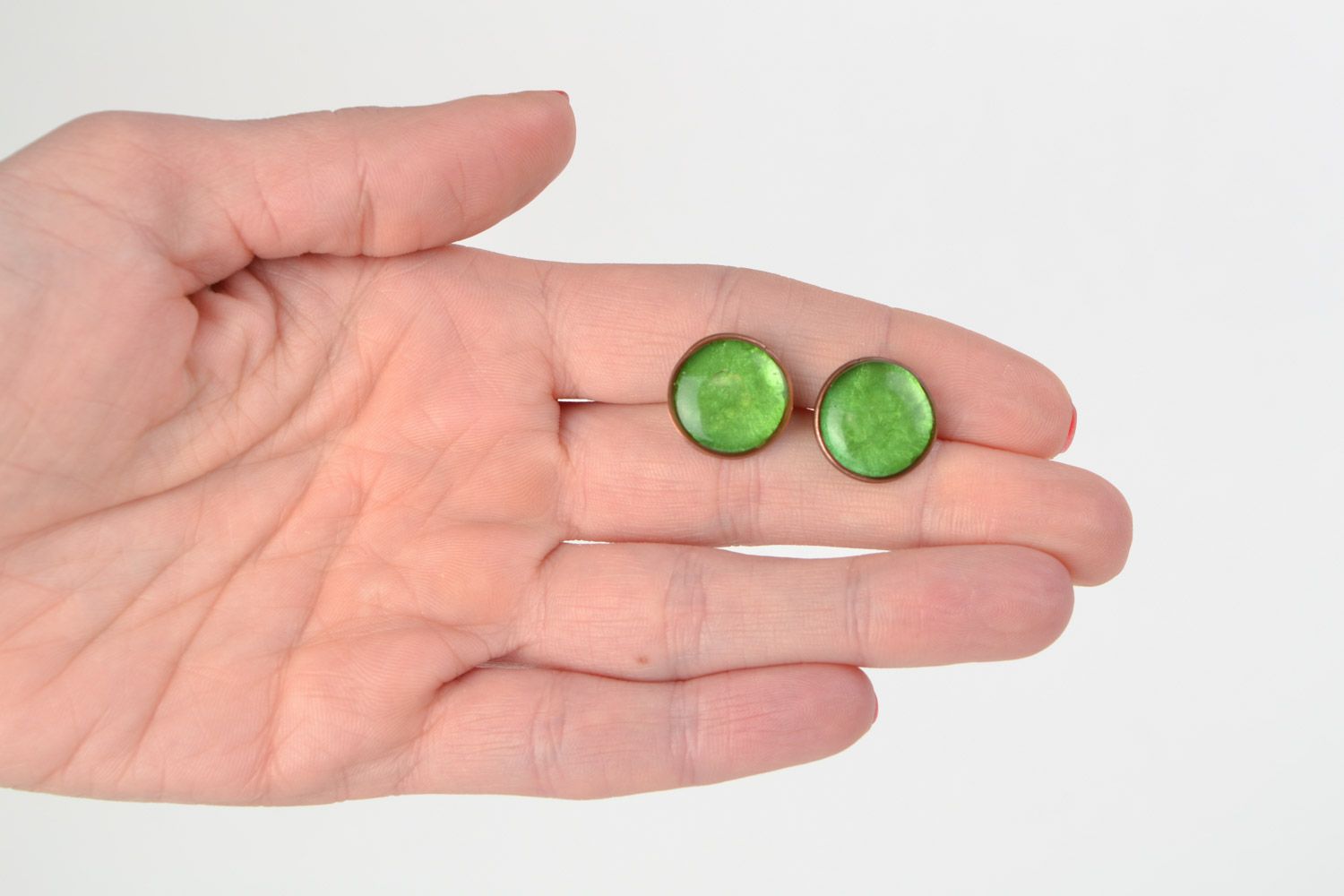 Handmade small epoxy resin stud earrings of round shape and green color photo 2
