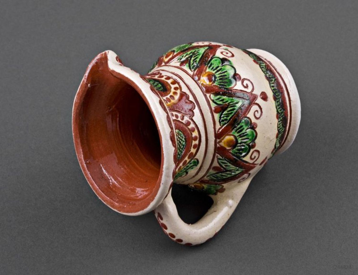Decorative clay pitcher photo 3
