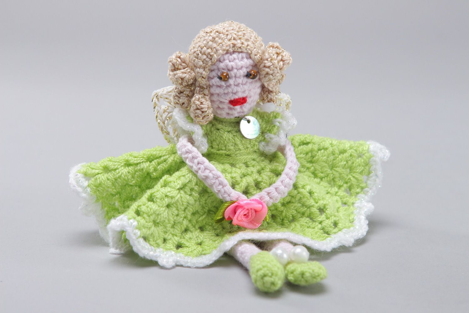 Handmade soft doll crocheted of cotton and acrylic threads Girl in green dress photo 1