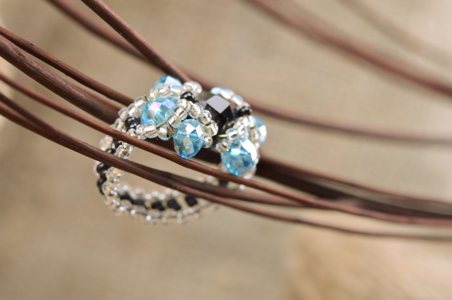 Beautiful elegant handmade beaded flower ring of blue and black colors photo 1