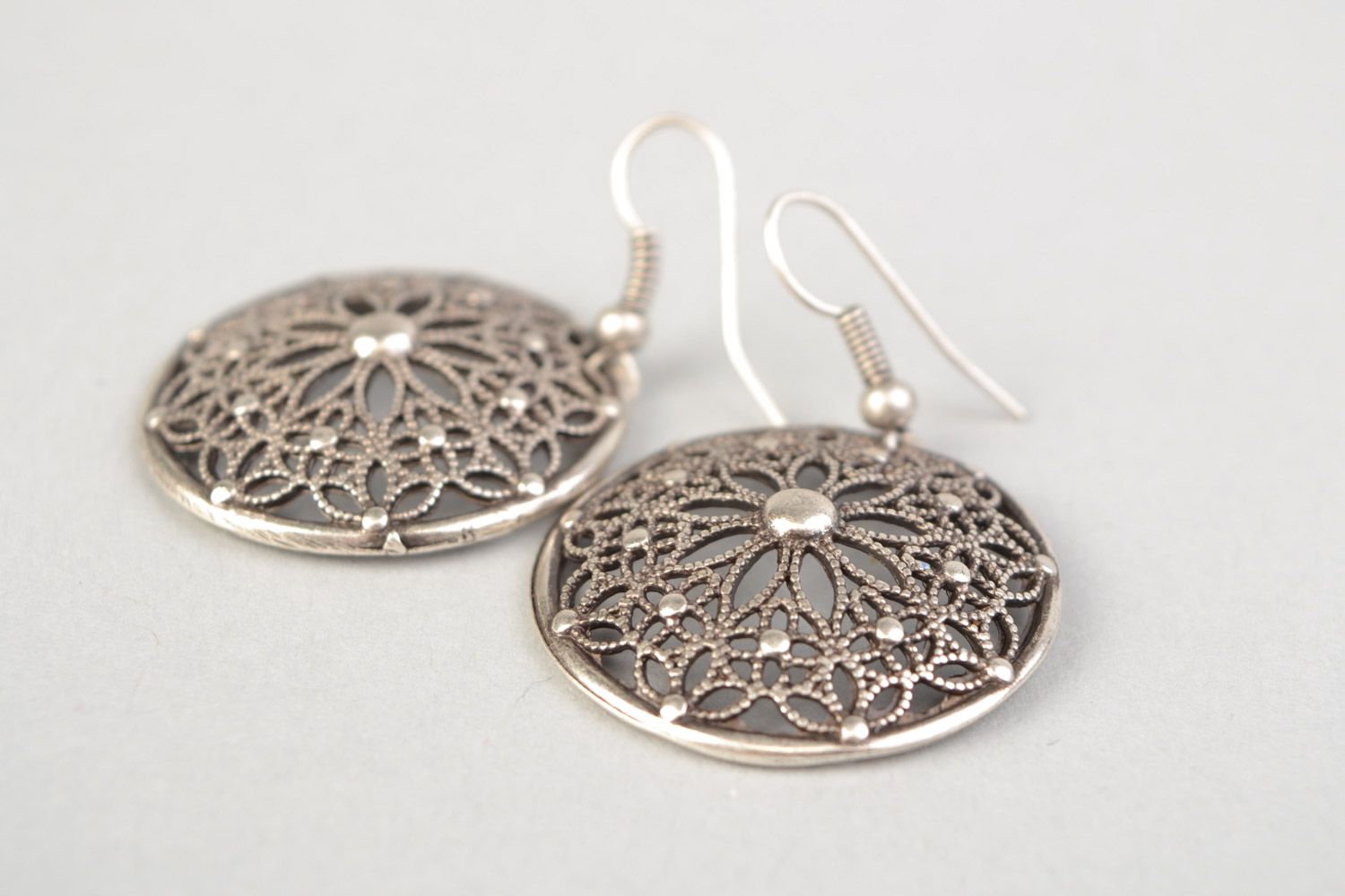 Handmade round lacy dangling earrings cast of metal alloy in ethnic style photo 4