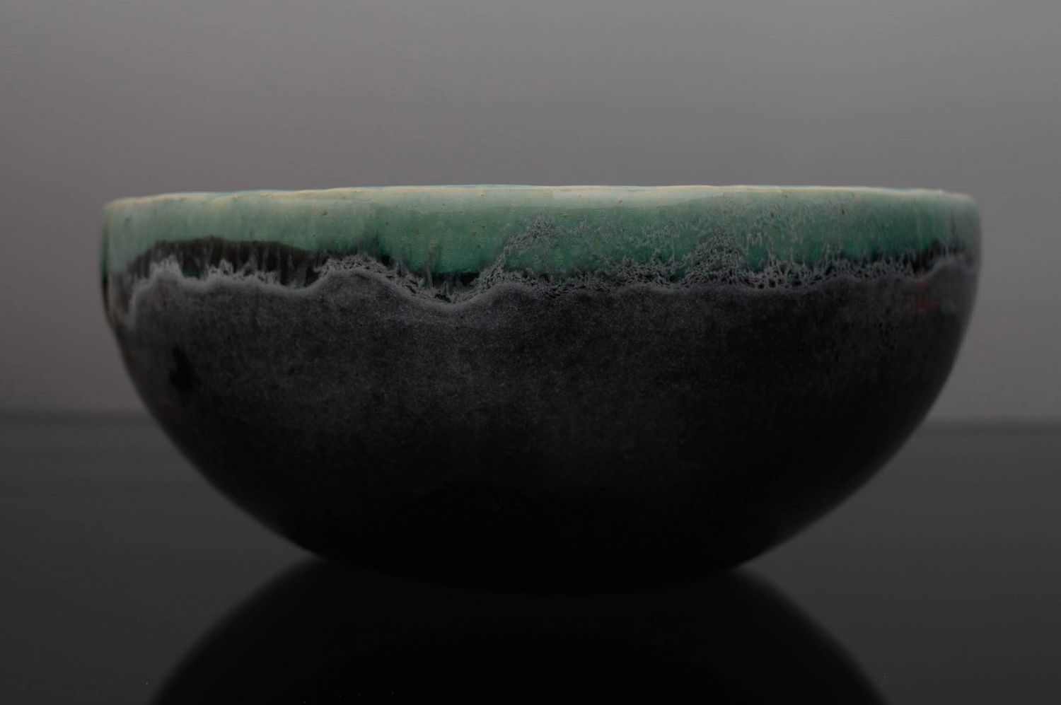 Glazed clay bowl photo 2