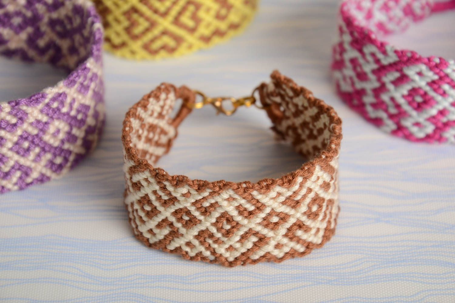 Handmade braided friendship bracelet made of floss thread white and brown photo 1