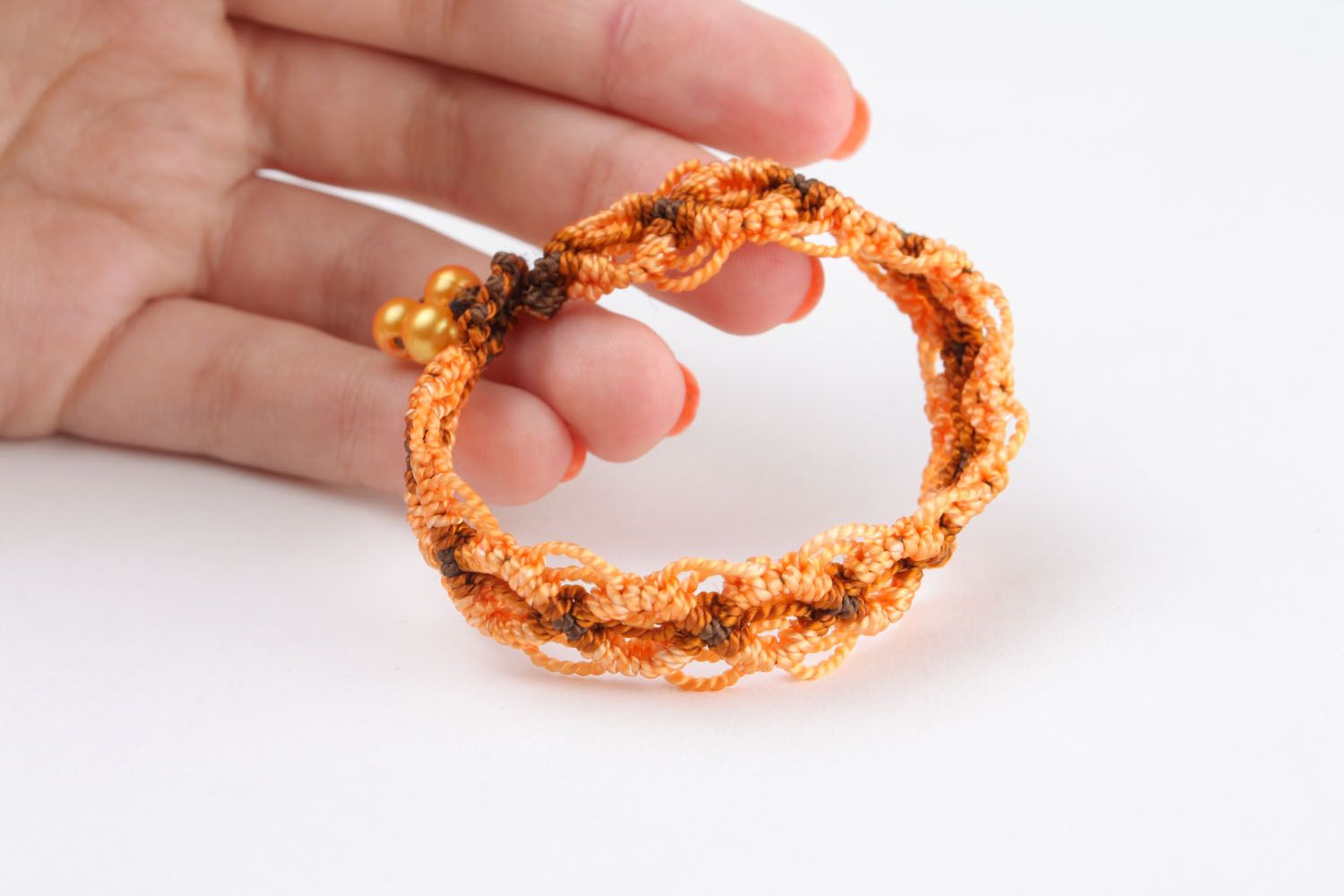 Bracelet tressé orange marron fait main photo 2
