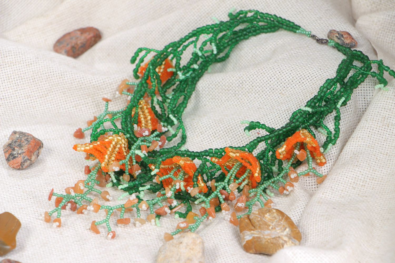 Handmade volume beaded necklace with natural stones in green and orange colors photo 1