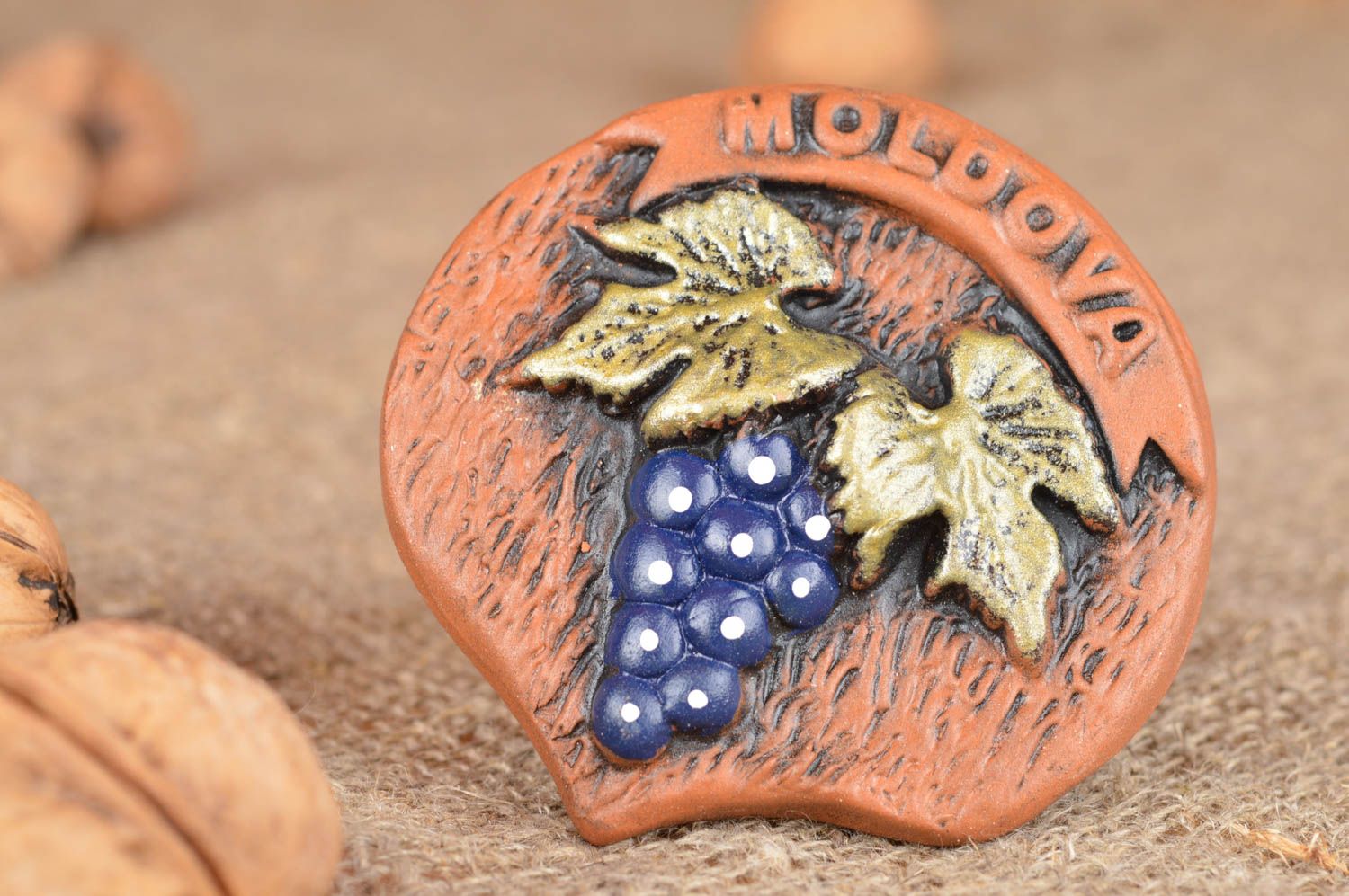 Handmade ceramic souvenir magnet for refrigerator decorated with grapes photo 1